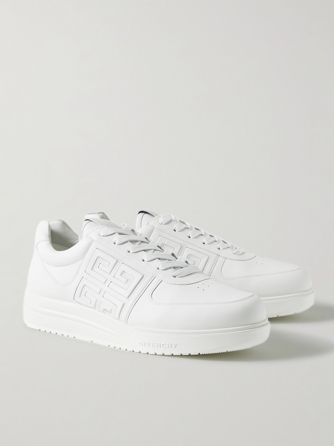 Shop Givenchy G4 Logo-embossed Leather Sneakers In White