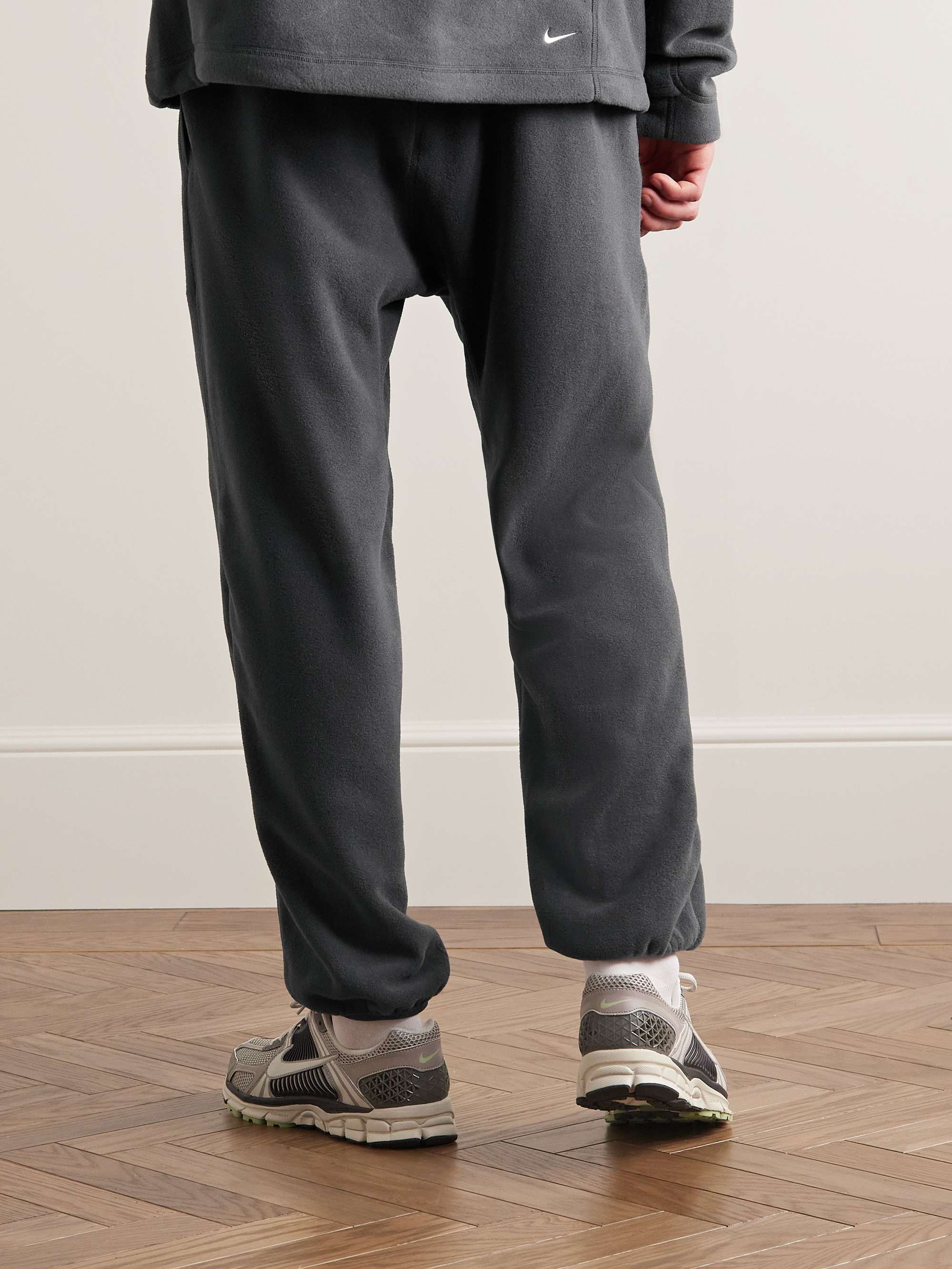 NIKE ACG Wolf Tree Tapered Logo-Embroidered Polartec® Fleece Sweatpants