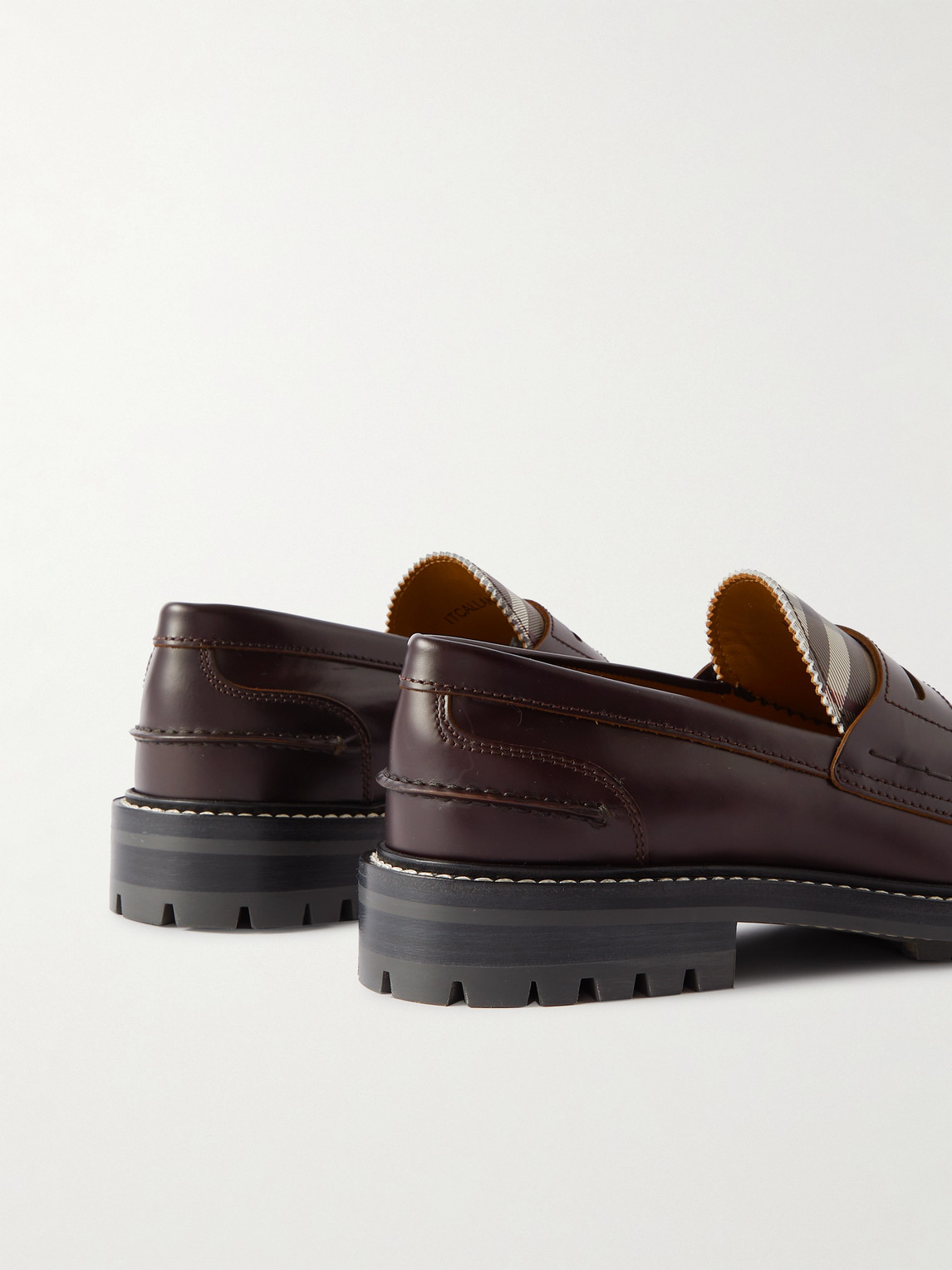 Shop Burberry Checked Leather Penny Loafers In Brown