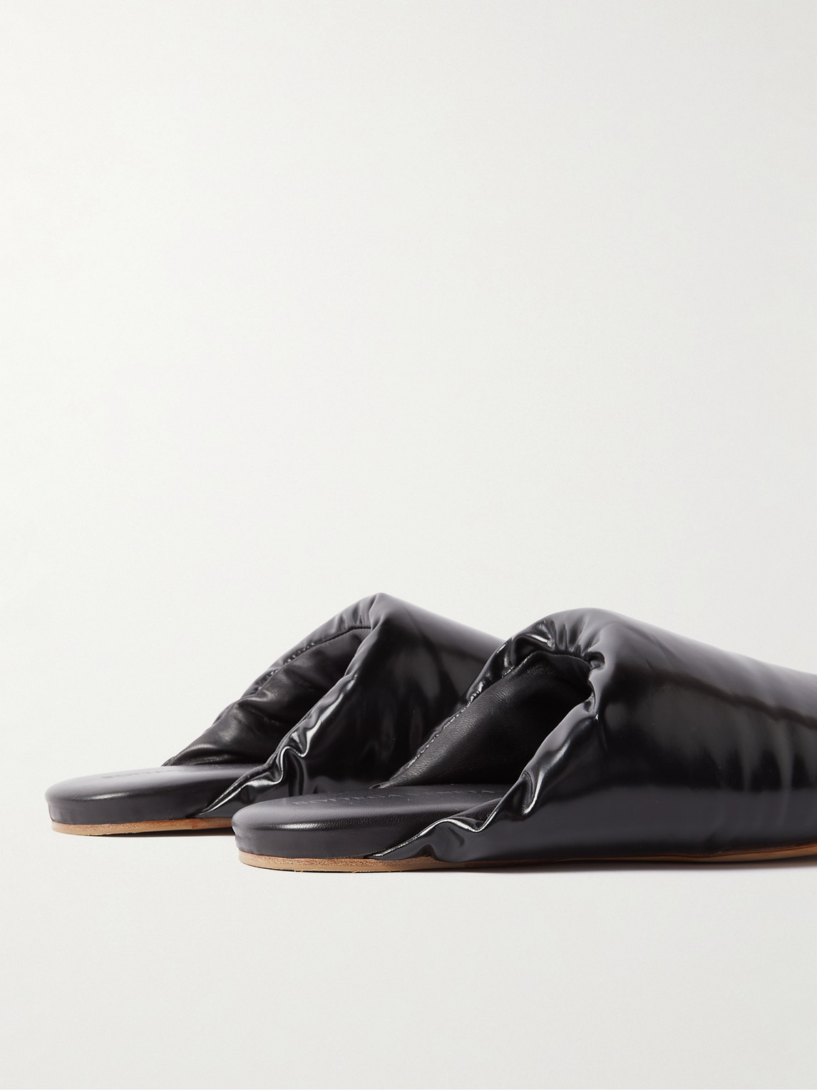 Shop Bottega Veneta Padded Glossed-leather Slides In Black