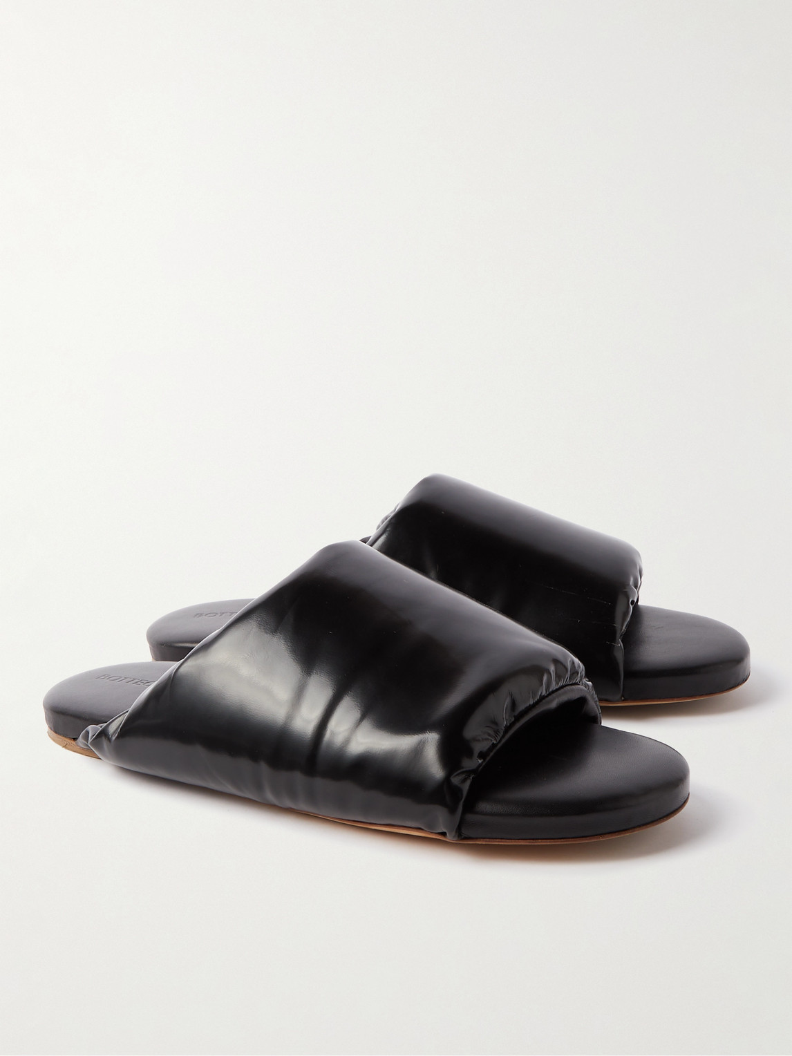 Shop Bottega Veneta Padded Glossed-leather Slides In Black