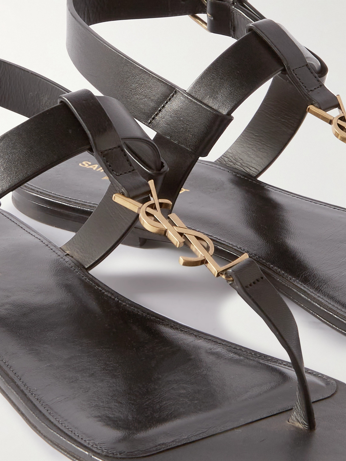 Shop Saint Laurent Cassandre Logo-embellished Leather Sandals In Black
