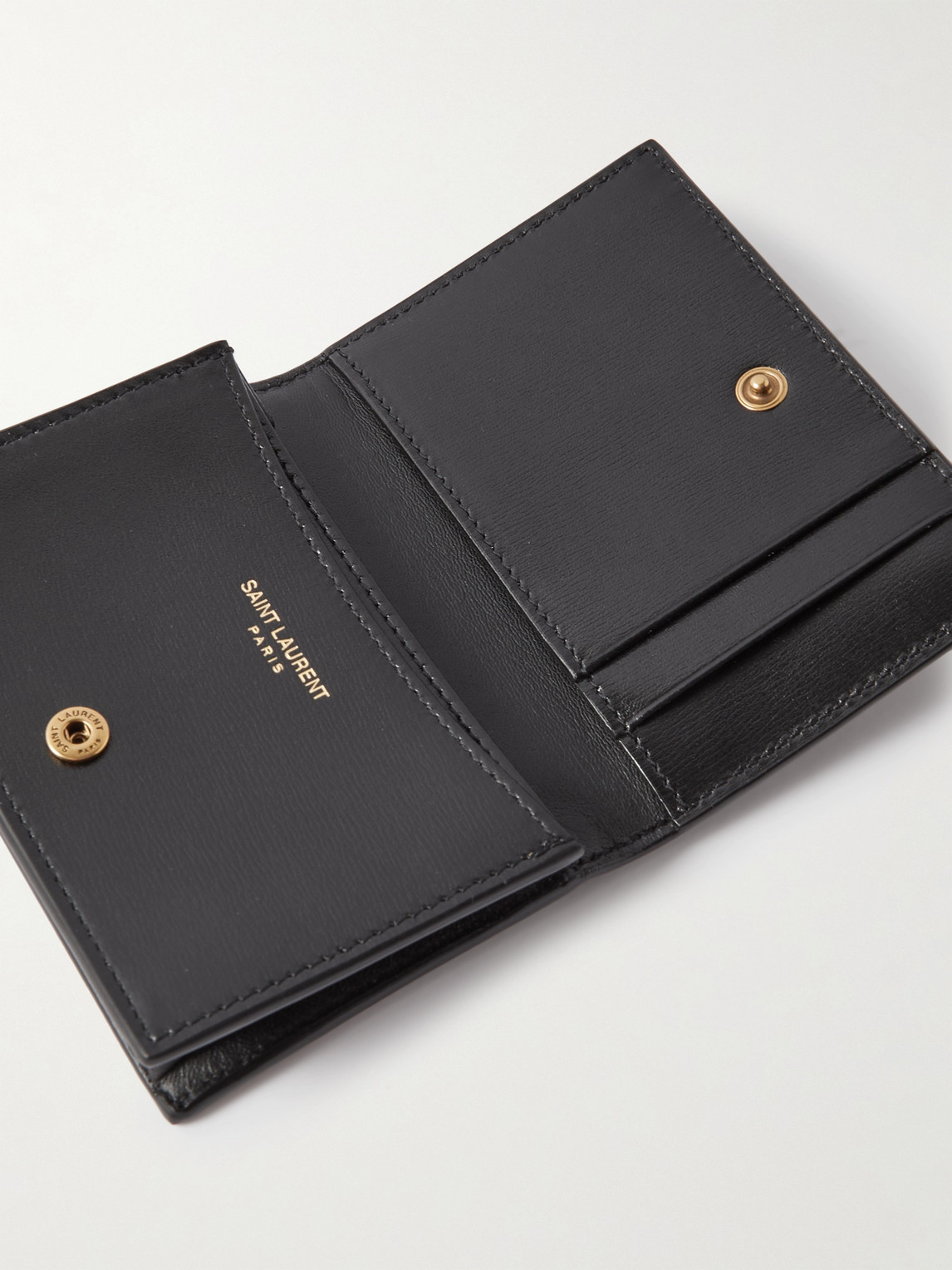 Shop Saint Laurent Logo-appliquéd Leather Cardholder In Black