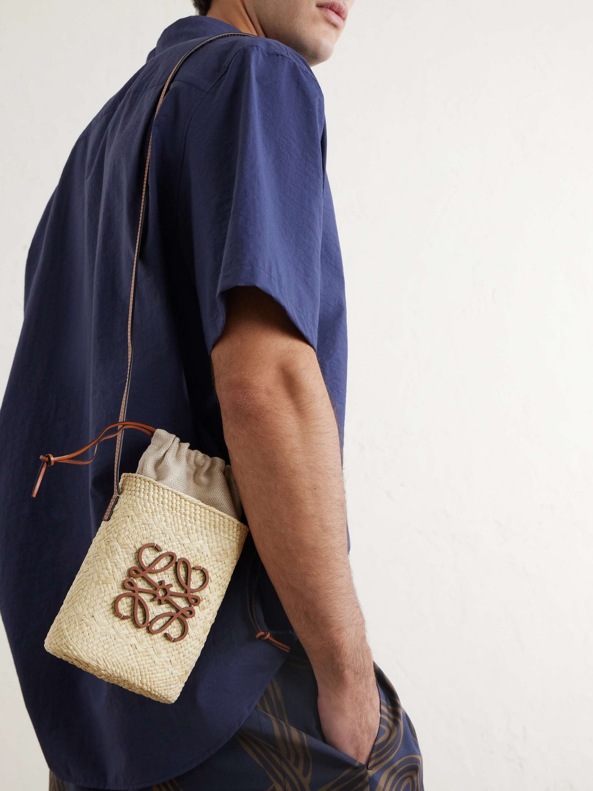 LOEWE + Paula's Ibiza Leather-Trimmed Raffia Bucket Bag