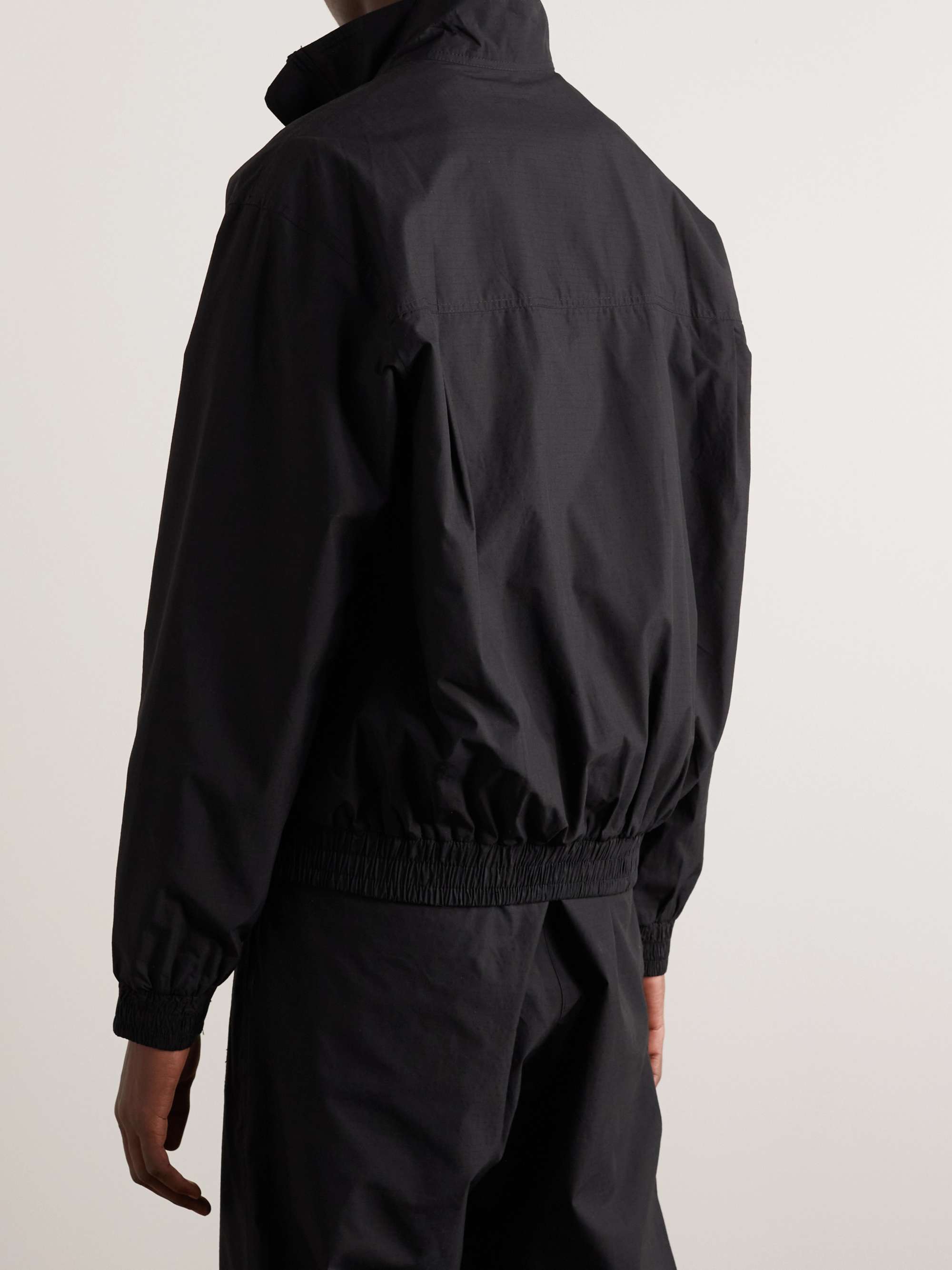 ADISH コットンリップストップ ジャケット ロゴアップリケ付き
