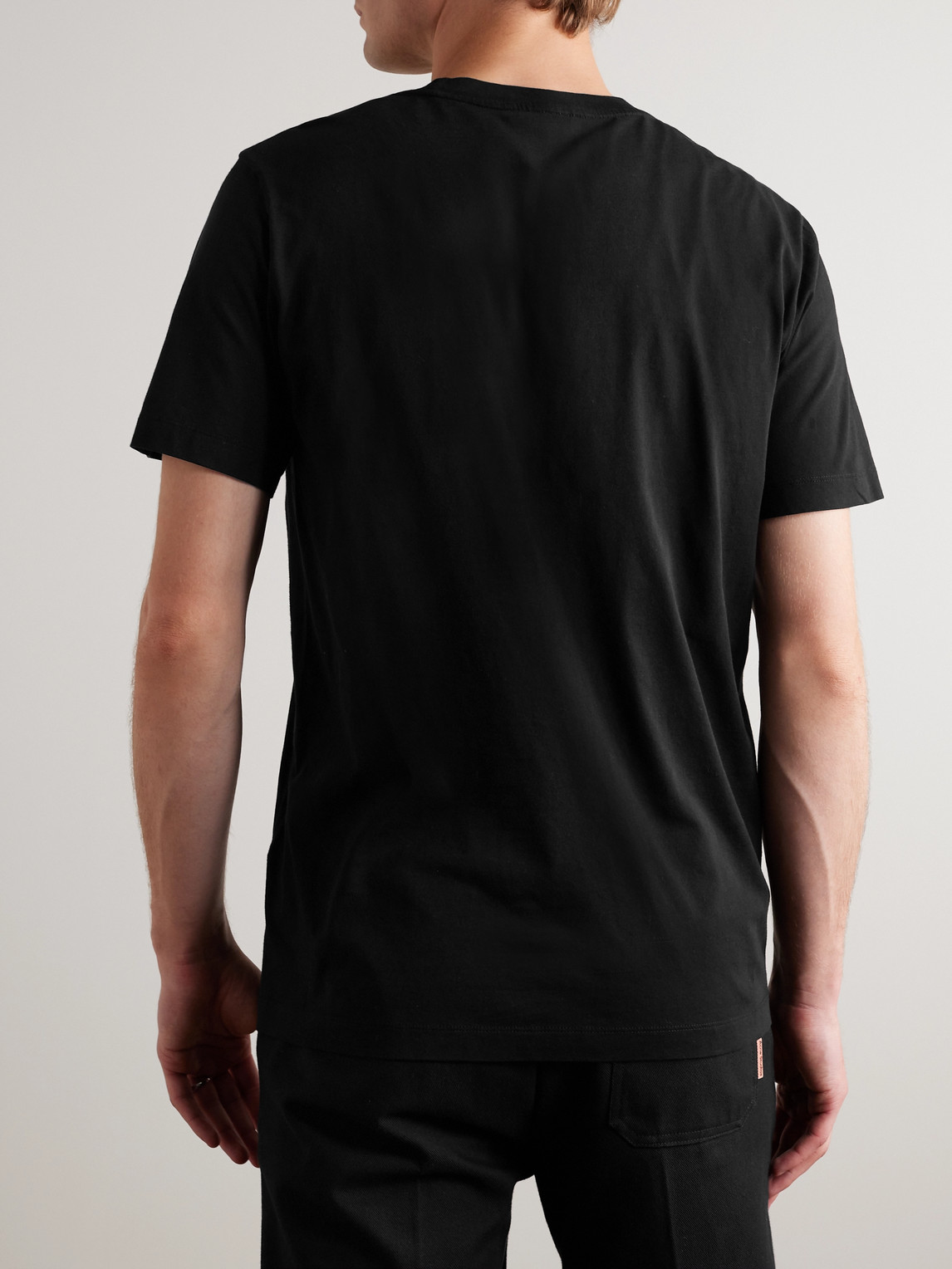 Shop Moncler Logo-flocked Cotton-jersey T-shirt In Black