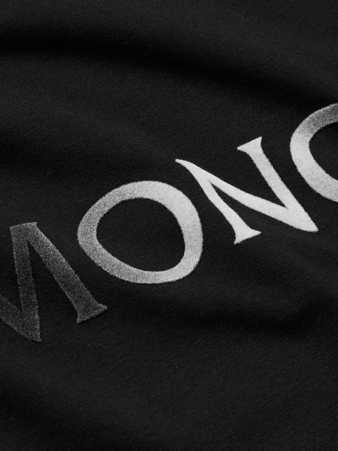 Shop Moncler Logo-flocked Cotton-jersey T-shirt In Black