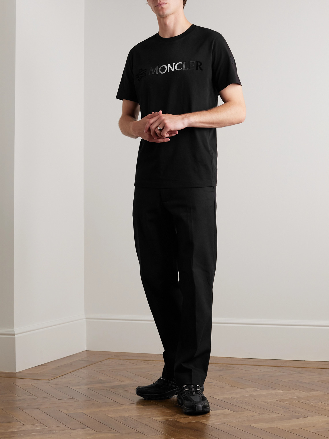 Shop Moncler Logo-flocked Cotton-jersey T-shirt In Black
