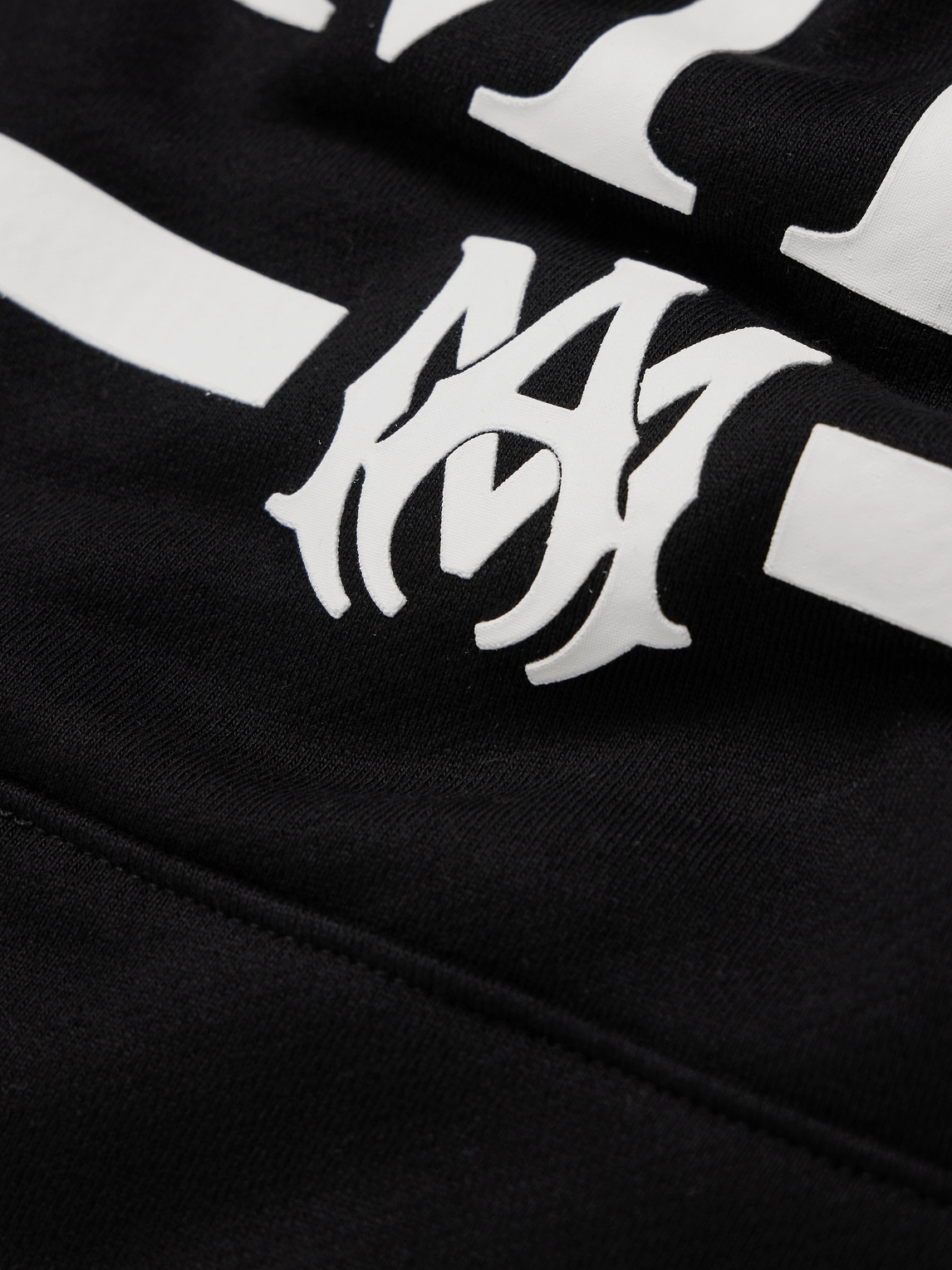 Shop Amiri Logo-appliquéd Cotton-jersey Hoodie In Black