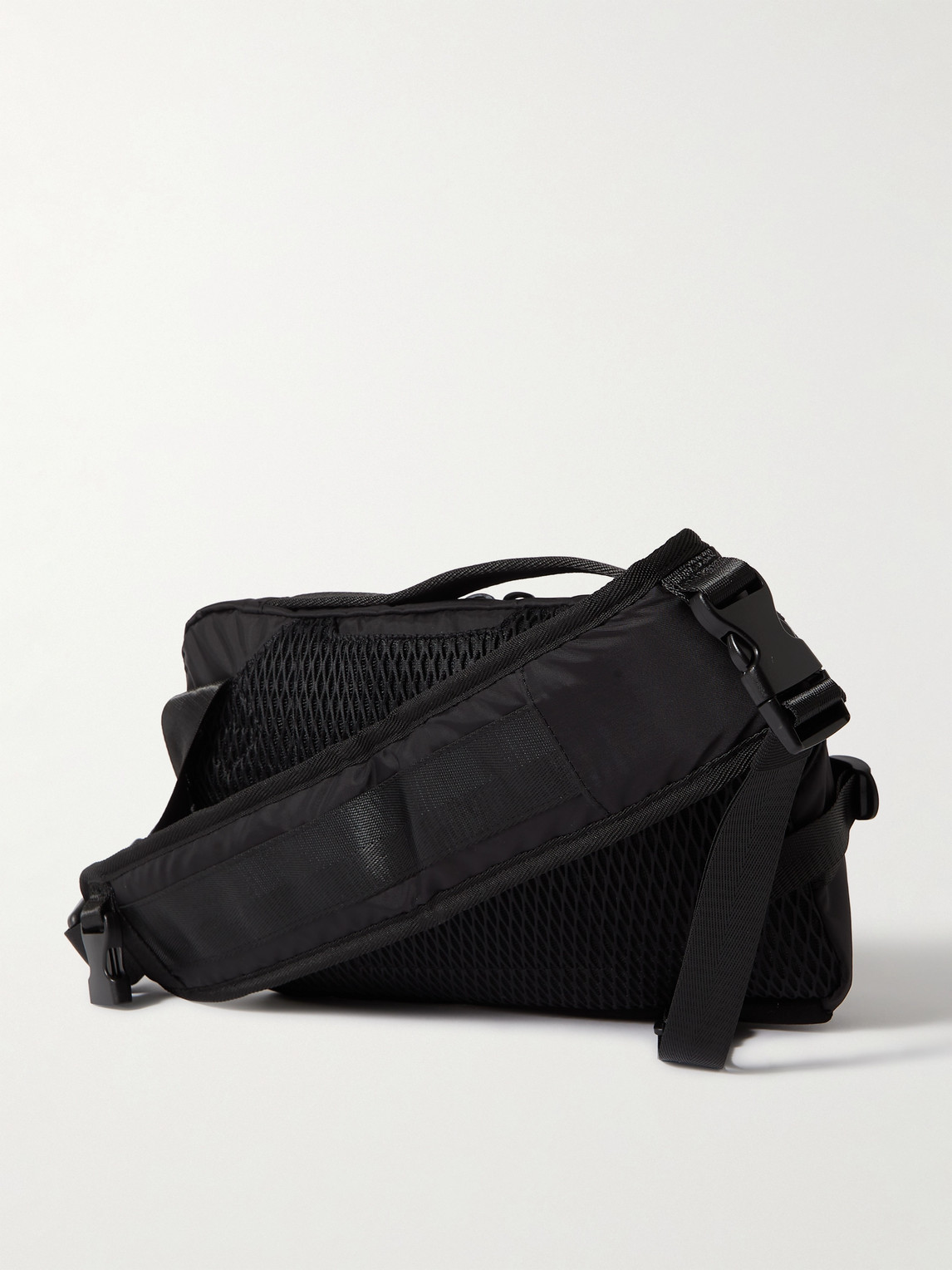 Shop Indispensable Logo-print Econyl® Messenger Bag In Black