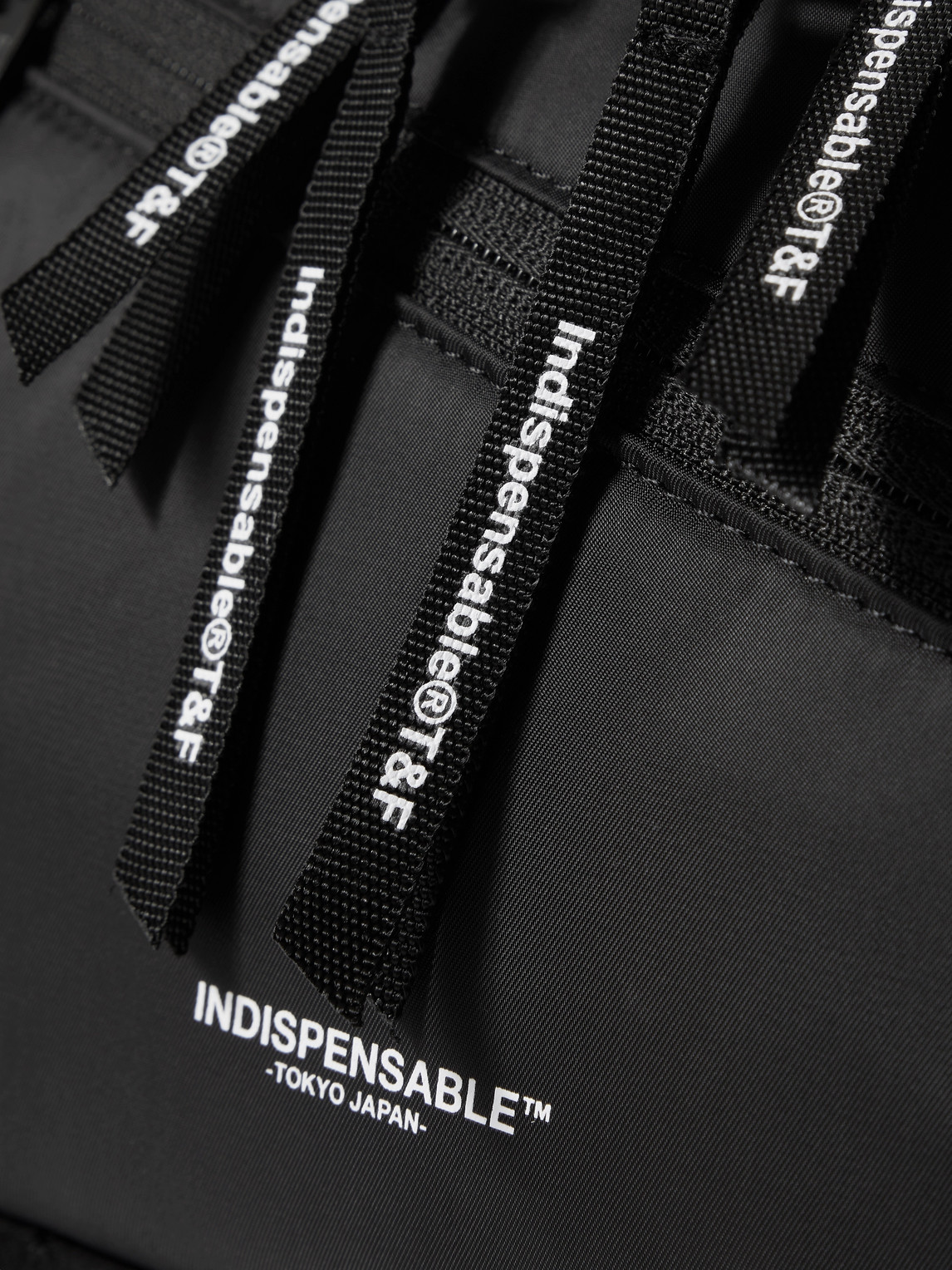Shop Indispensable Logo-print Econyl® Messenger Bag In Black