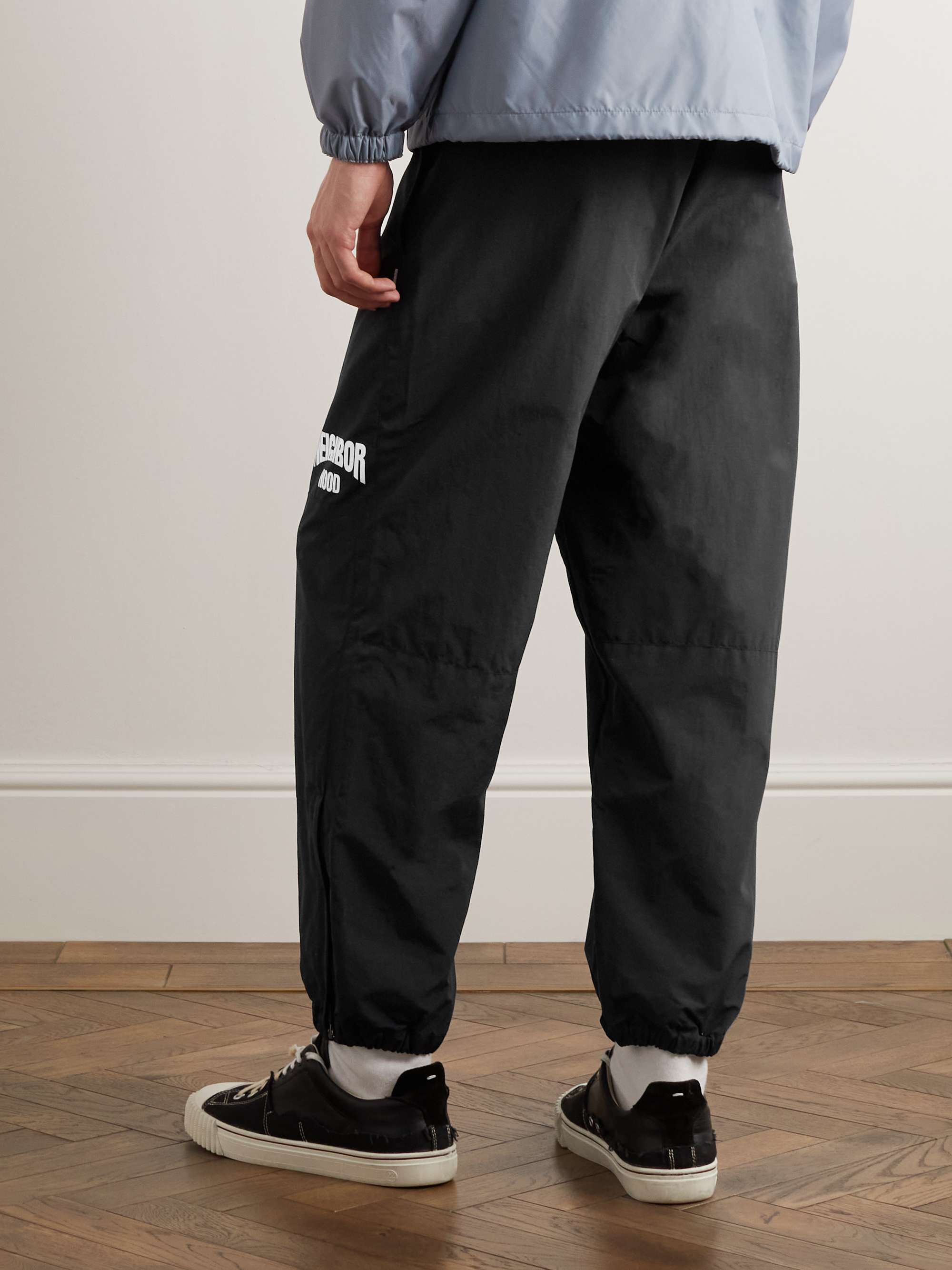 NEIGHBORHOOD Tapered Logo-Print Shell Trousers