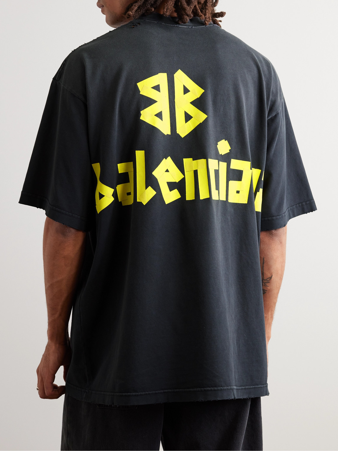 Shop Balenciaga Oversized Distressed Logo-print Cotton-jersey T-shirt In Black