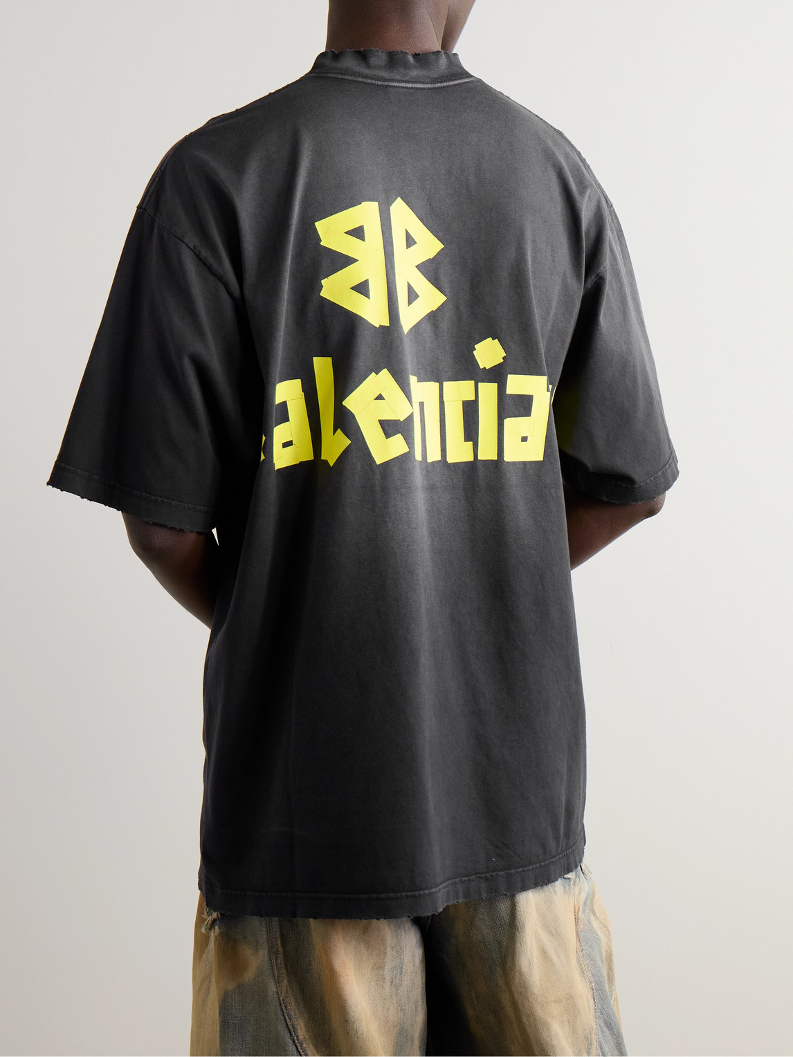 Shop Balenciaga Oversized Distressed Logo-print Cotton-jersey T-shirt In Black