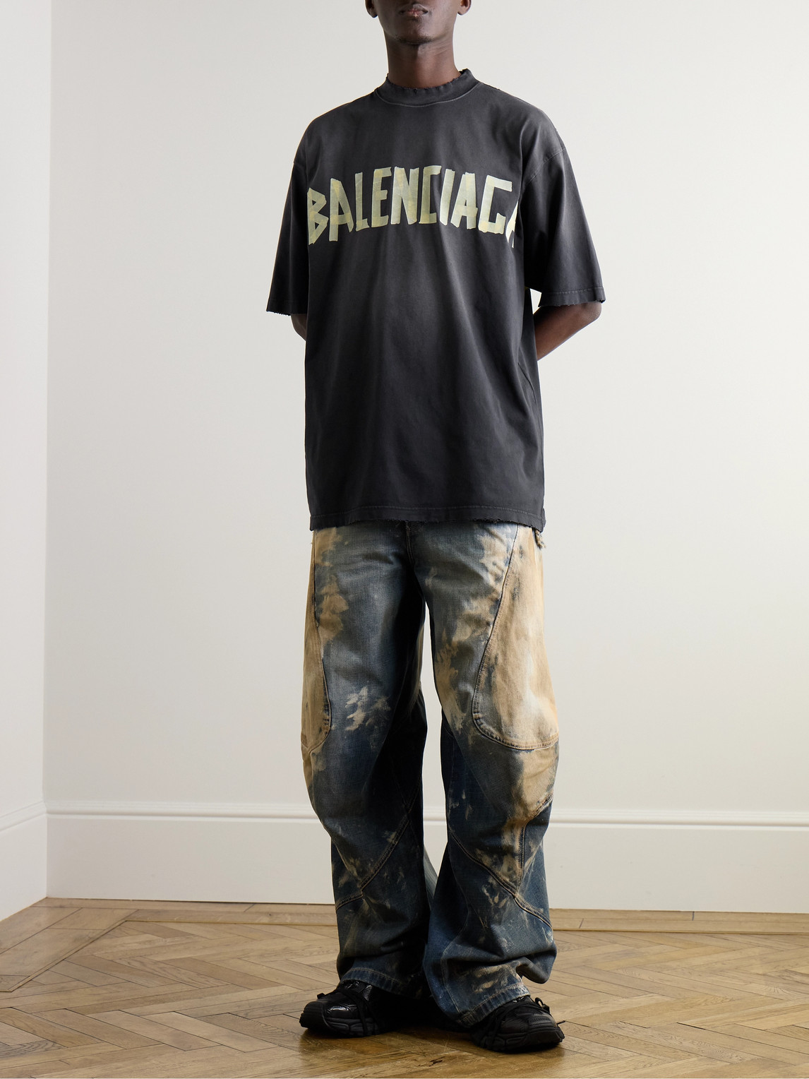 Shop Balenciaga Oversized Distressed Logo-print Cotton-jersey T-shirt In Black