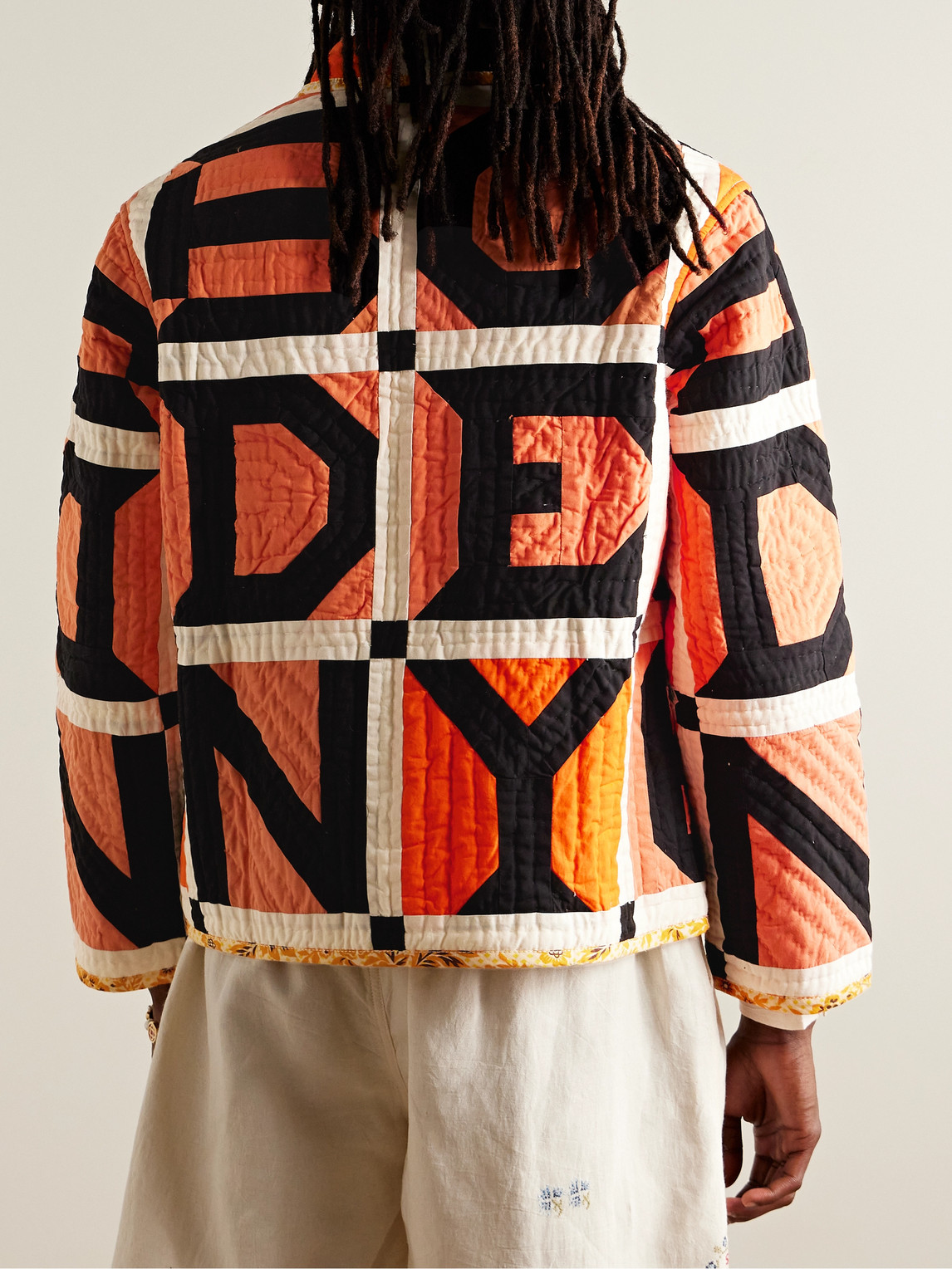 Shop Bode Letter Block Quilted Padded Printed Cotton Jacket In Orange