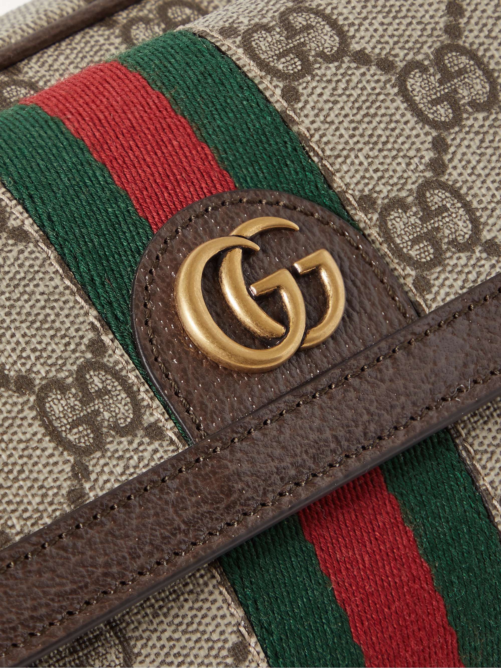 GUCCI حقيبة ماسنجر Ophidia صغيرة من الكنفا المغلف المزيّن بشعار العلامة مع حاشية من الجلد