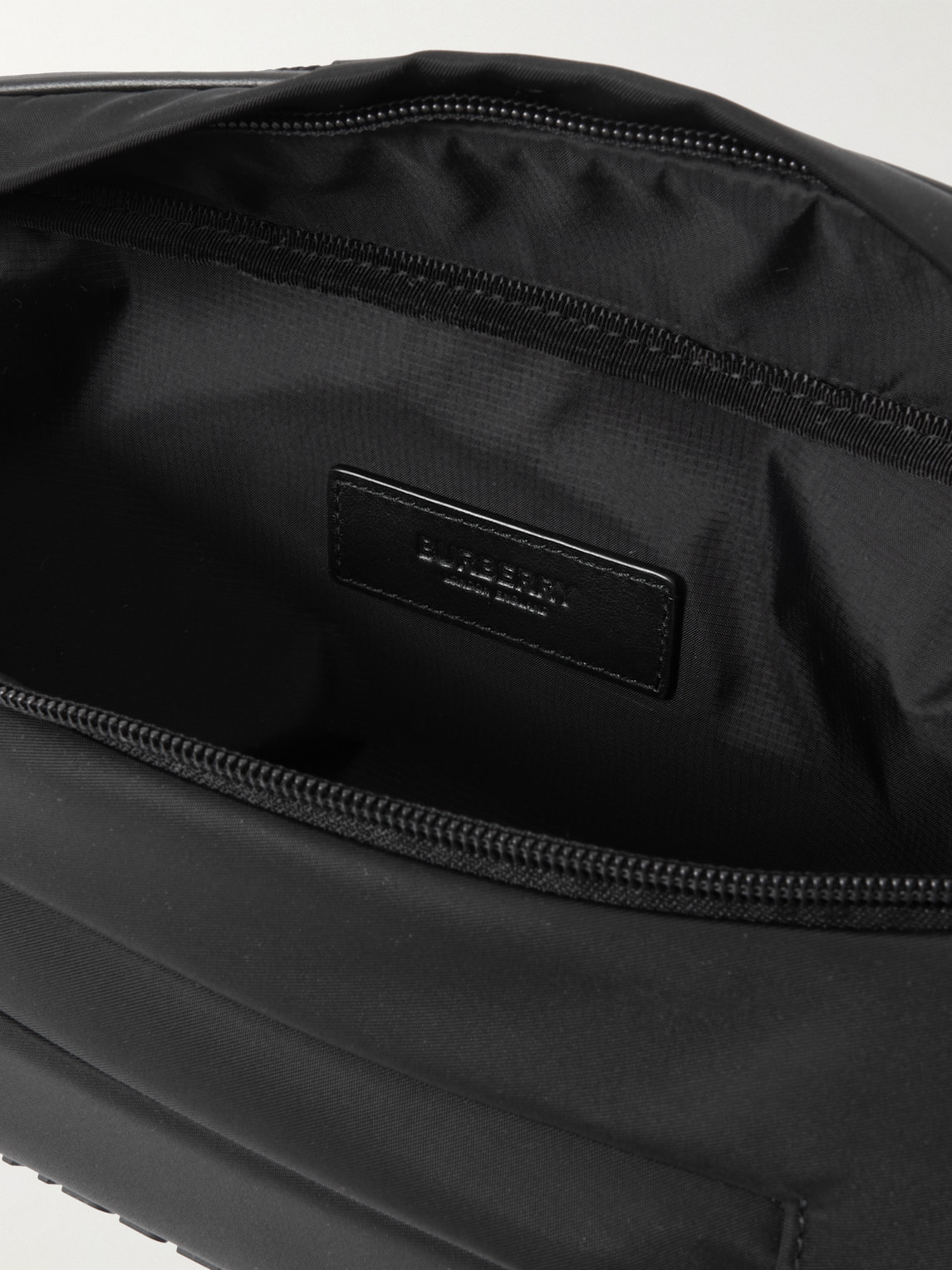 Shop Burberry Logo-appliquéd Nylon Belt Bag In Black