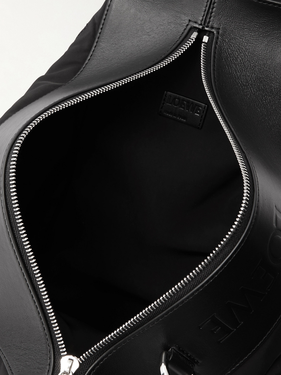 Shop Loewe Logo-embossed Leather-trimmed Shell Backpack In Black