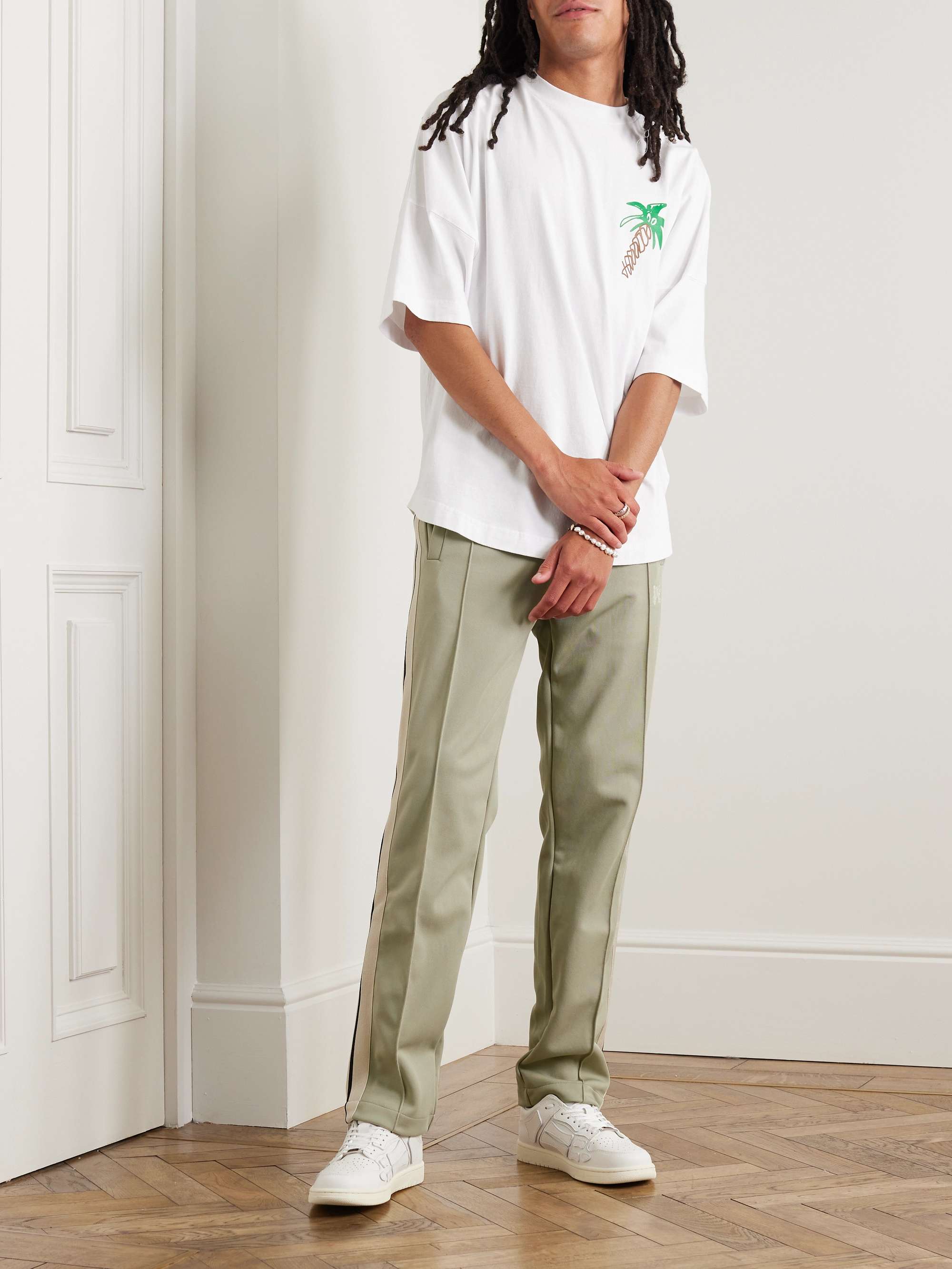 Shop SNIPES Small Logo Cargo Track Pants SNQ4224011M green | SNIPES USA