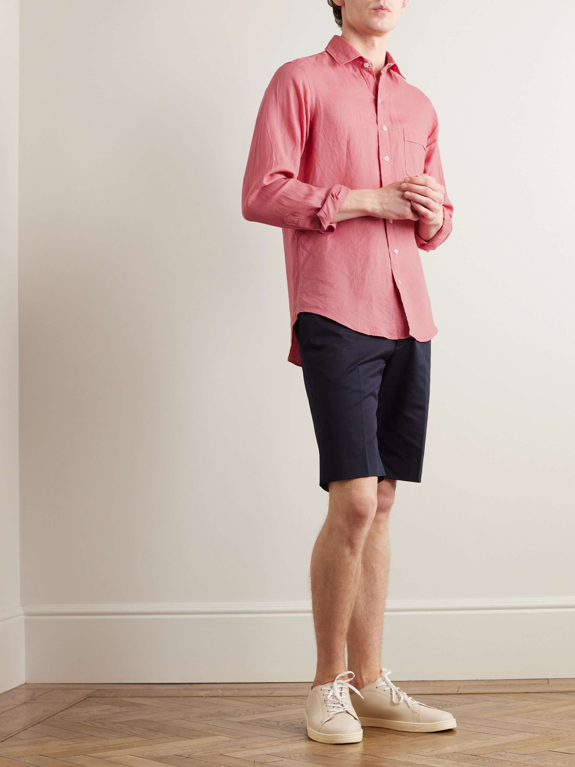 Does a pink shirt go with brown shorts?