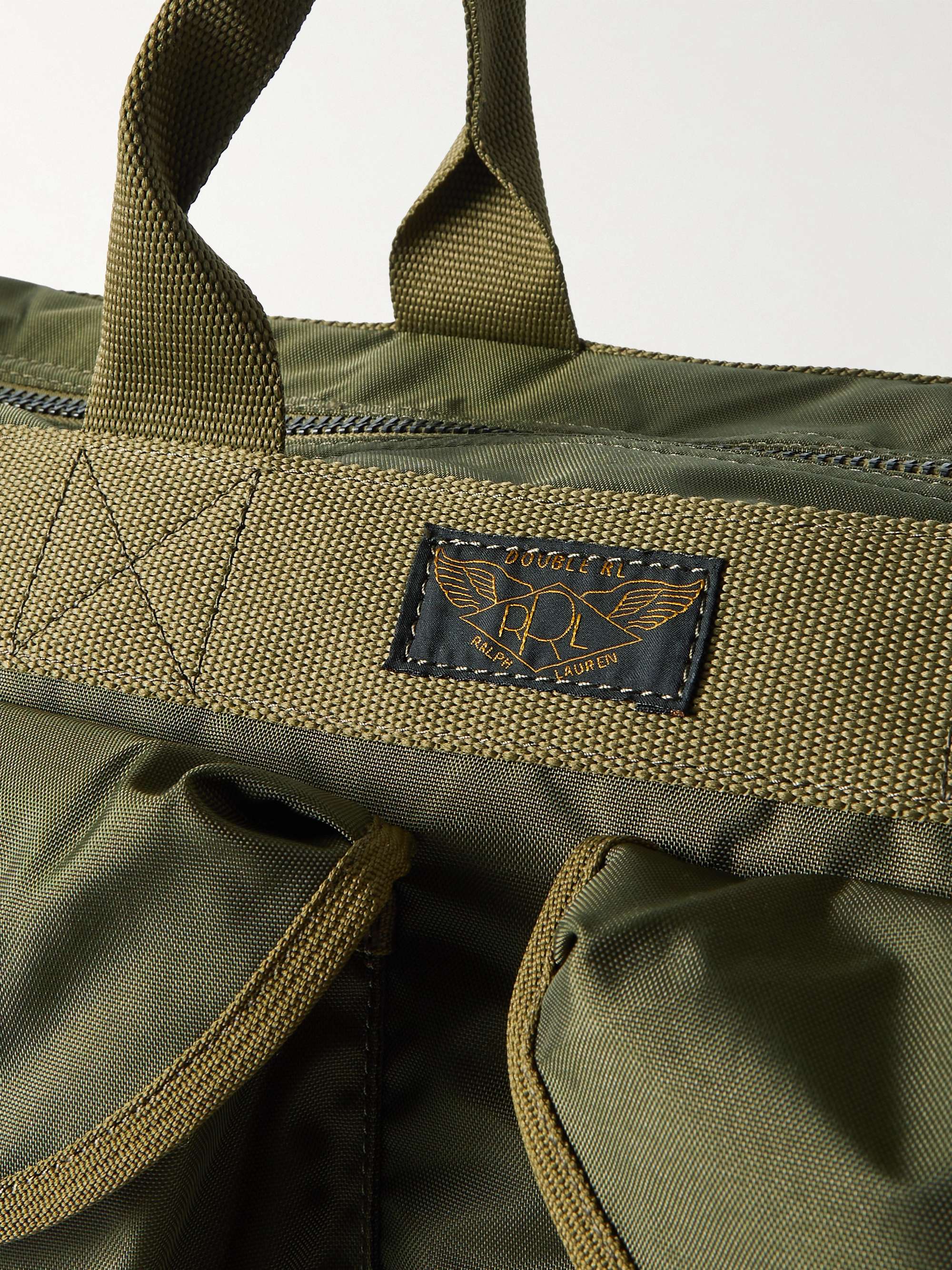 Webbing and leather-trimmed embroidered canvas tote