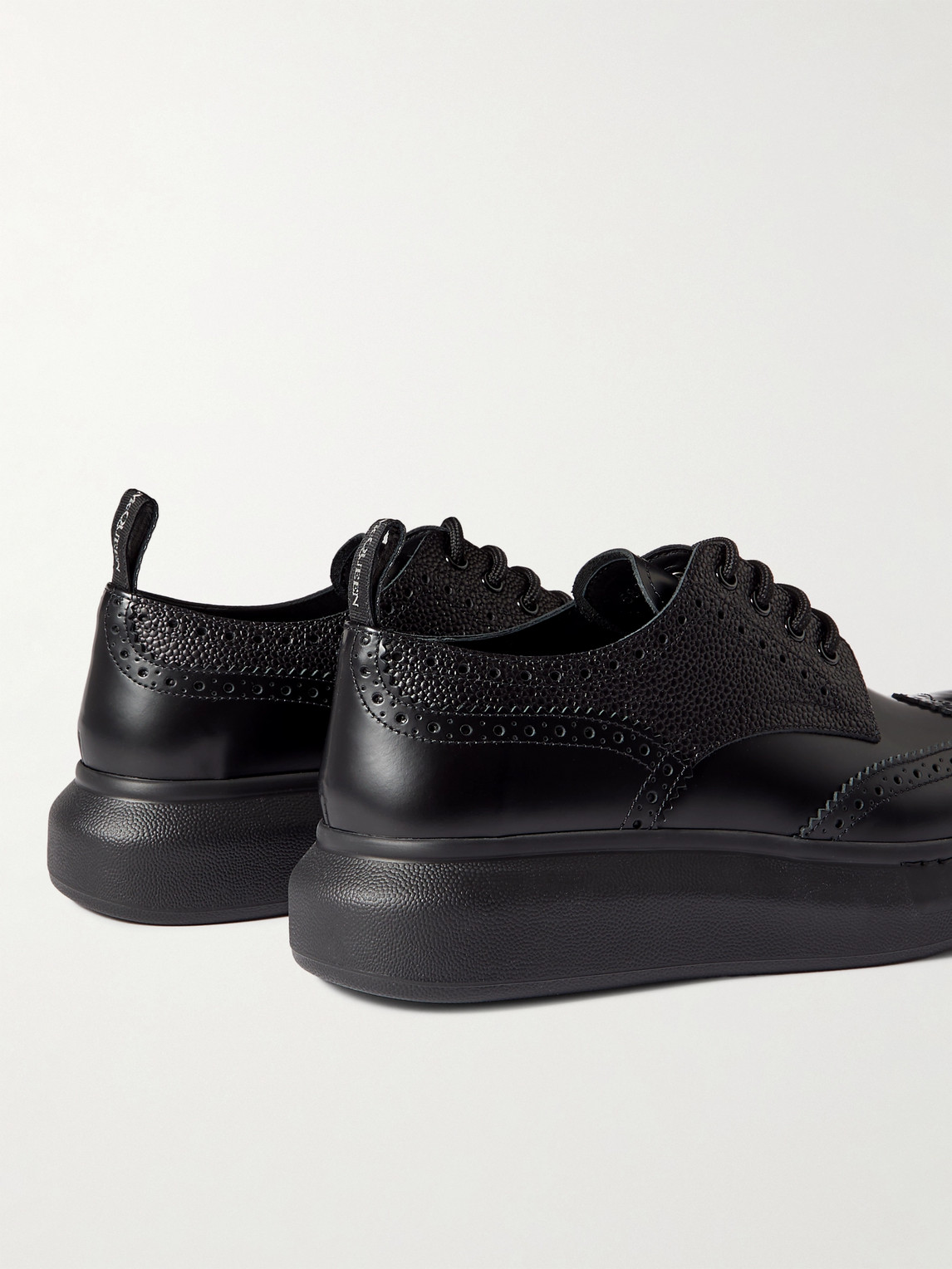 Shop Alexander Mcqueen Exaggerated-sole Leather Brogues In Black
