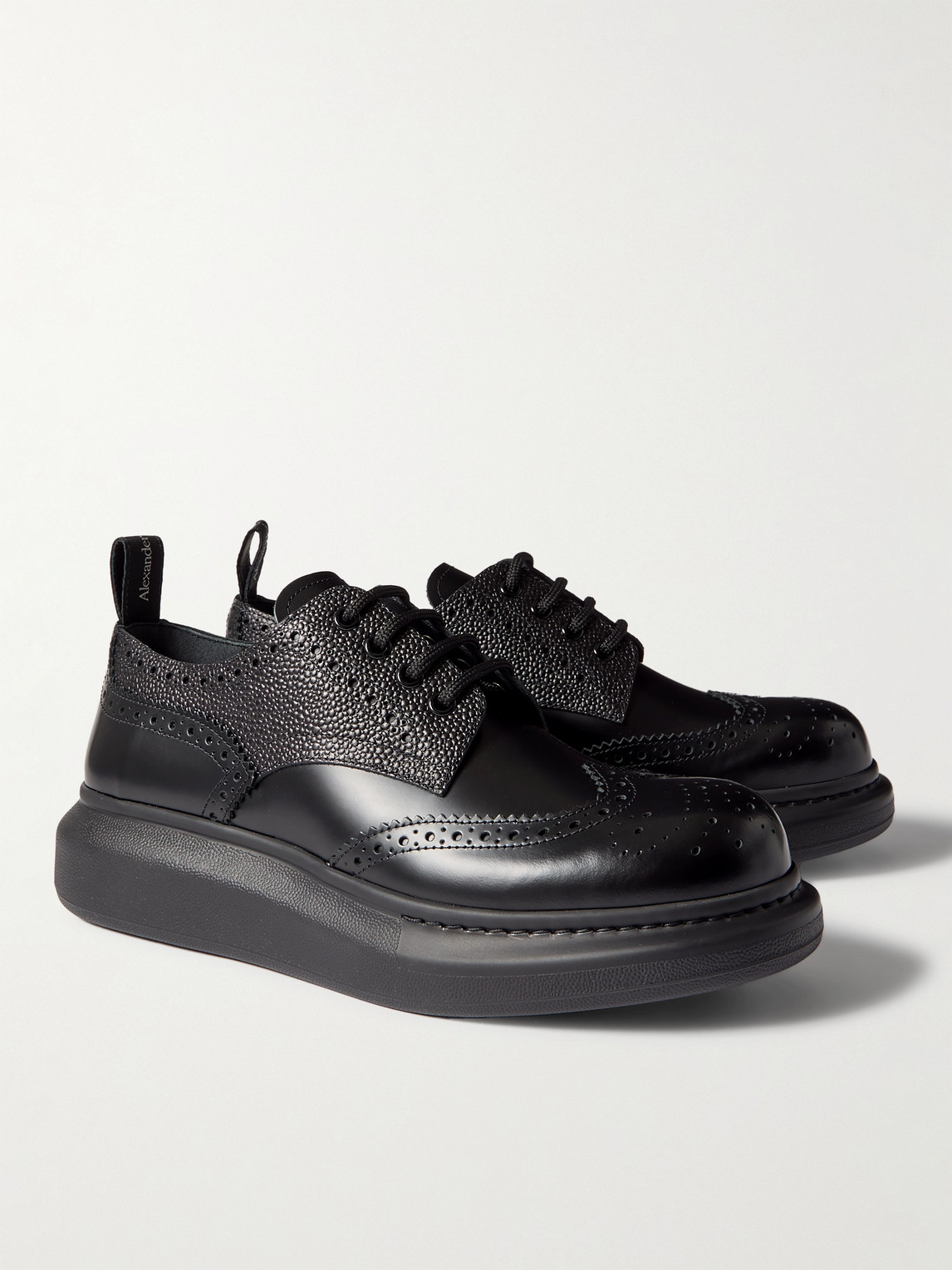 Shop Alexander Mcqueen Exaggerated-sole Leather Brogues In Black