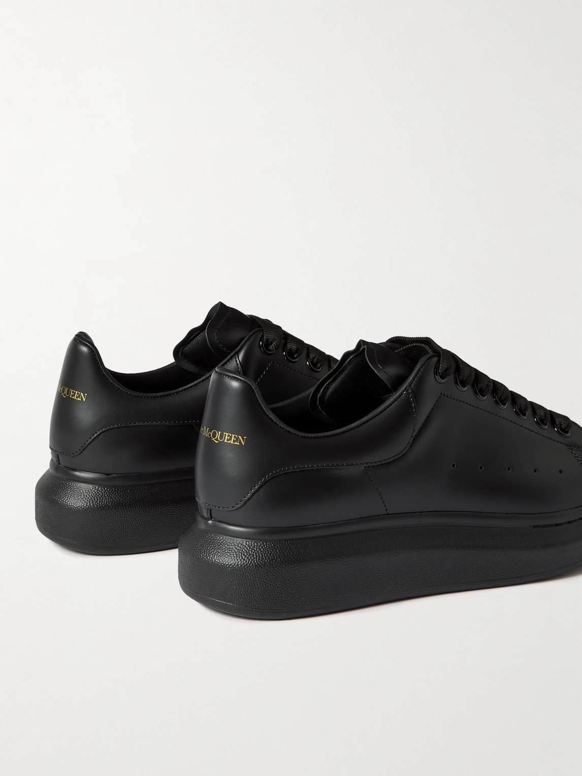 Alexander Mcqueen Men Black Sneakers With Logo Lettering On The Rear And Oversize Rubber Sole In Lea In Black