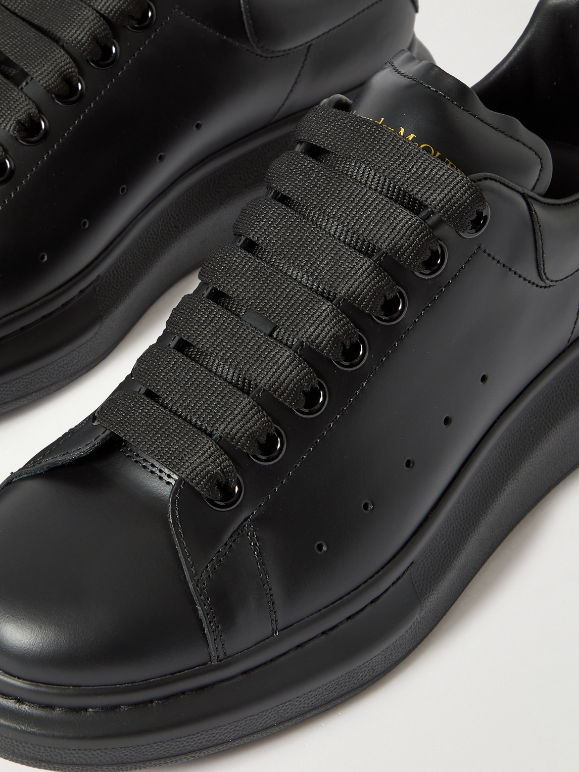 Alexander Mcqueen Men Black Sneakers With Logo Lettering On The Rear And Oversize Rubber Sole In Lea In Black