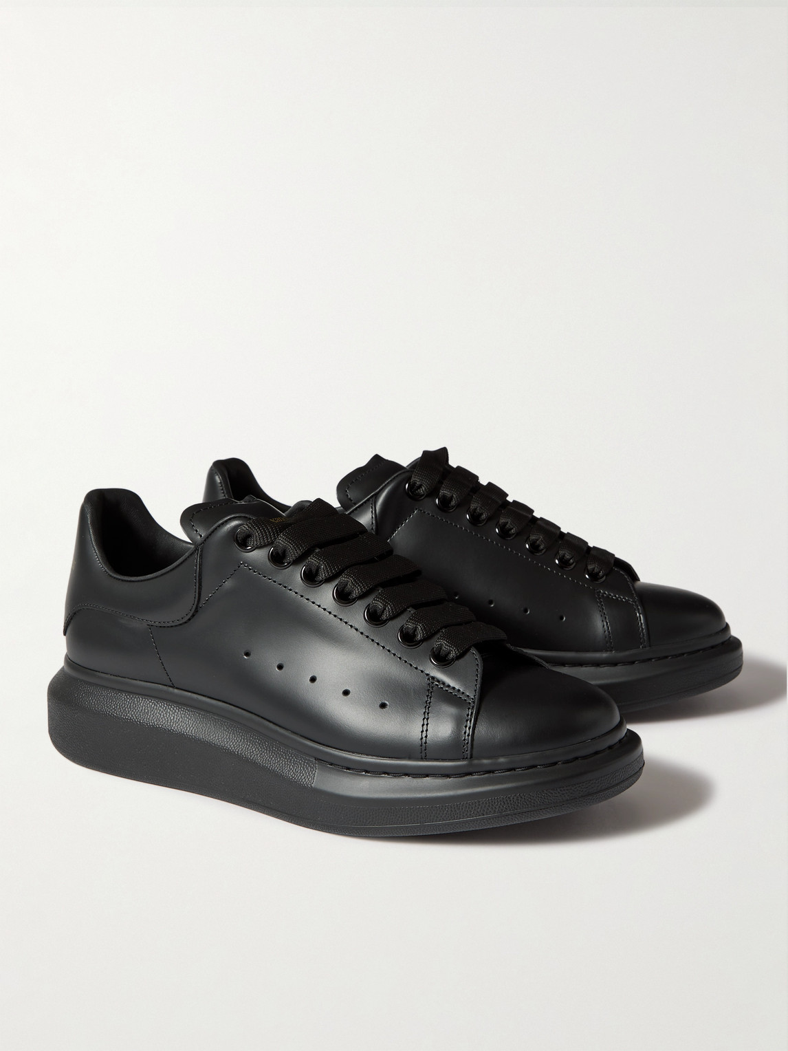 Alexander Mcqueen Men Black Sneakers With Logo Lettering On The Rear And Oversize Rubber Sole In Lea In Black