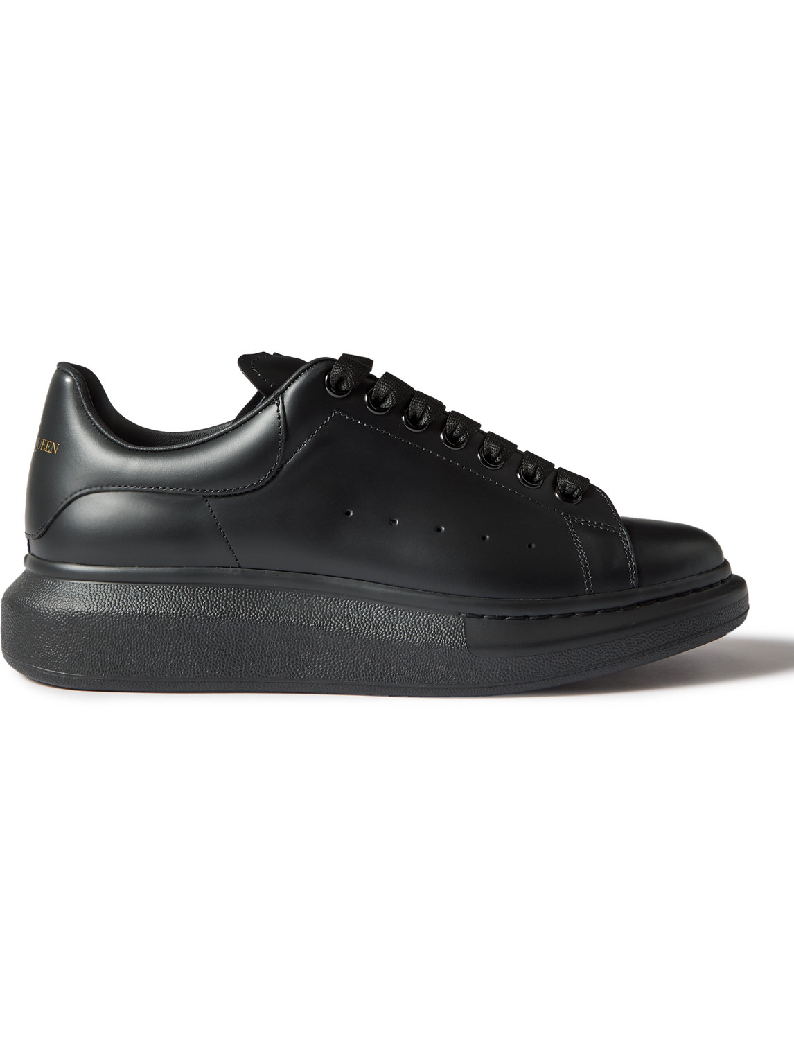 Alexander Mcqueen Exaggerated-sole Studded Leather Trainers In Black