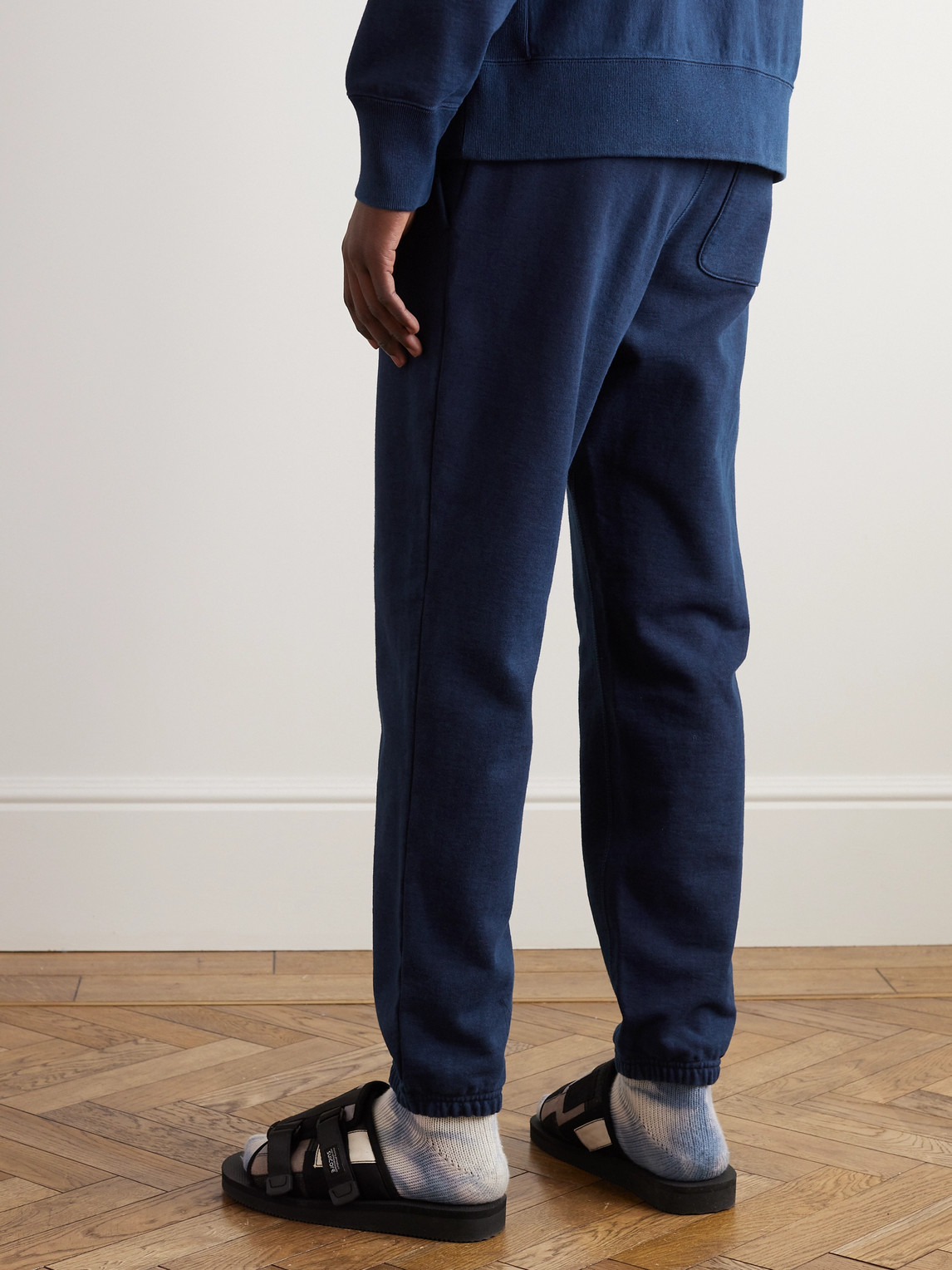 Shop Blue Blue Japan Tapered Indigo-dyed Cotton-jersey Sweatpants In Blue