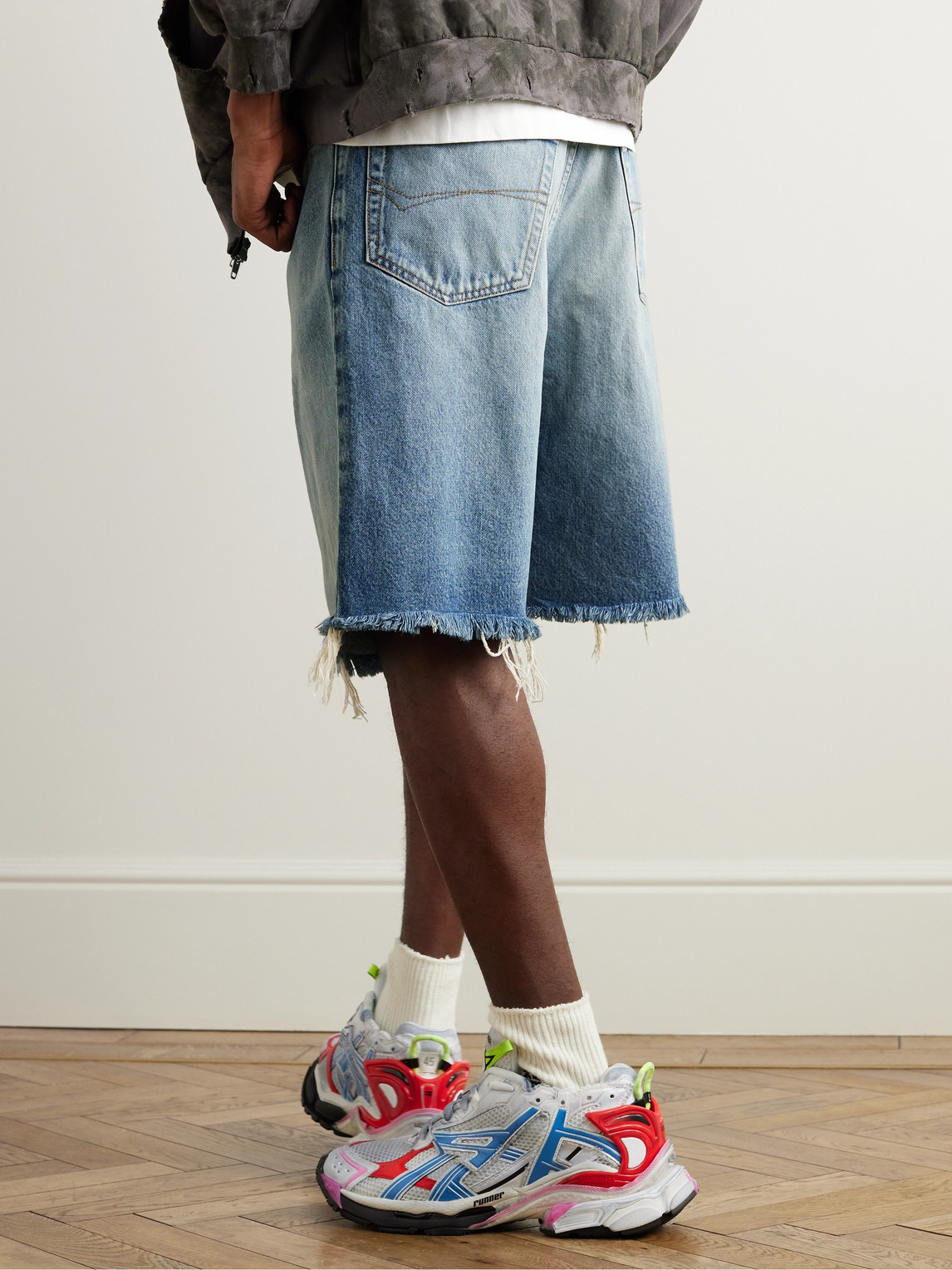 BALENCIAGA SKATER WIDE-LEG DISTRESSED DENIM SHORTS