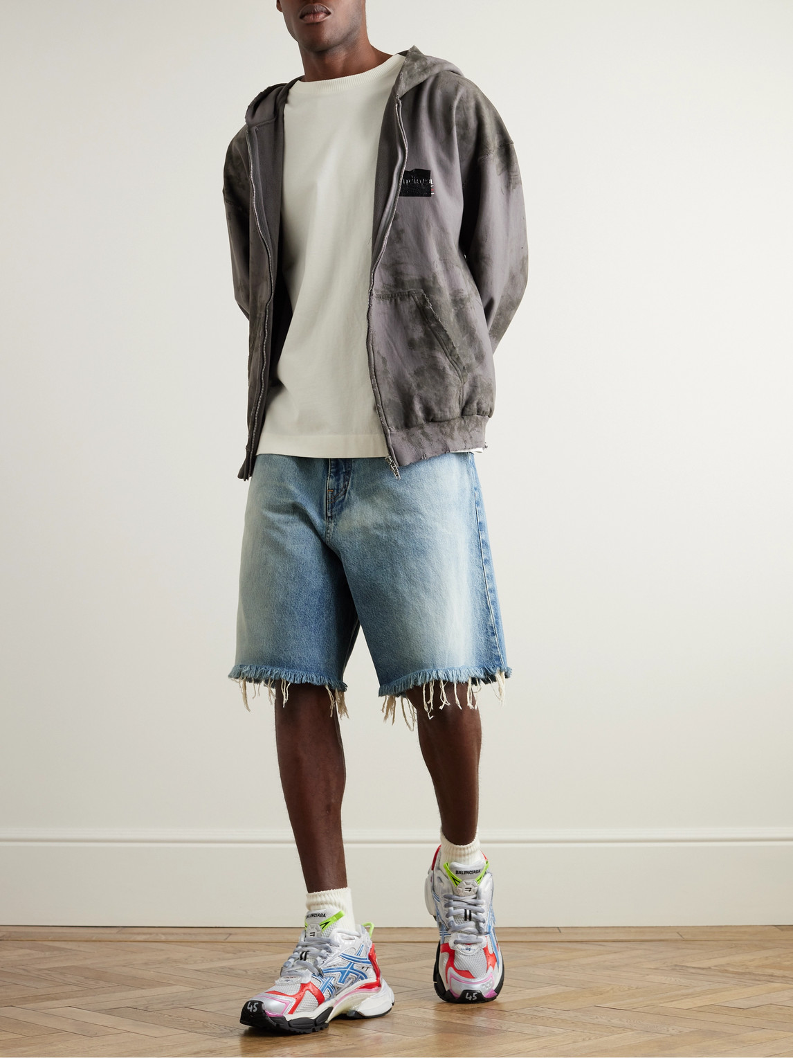 BALENCIAGA SKATER WIDE-LEG DISTRESSED DENIM SHORTS