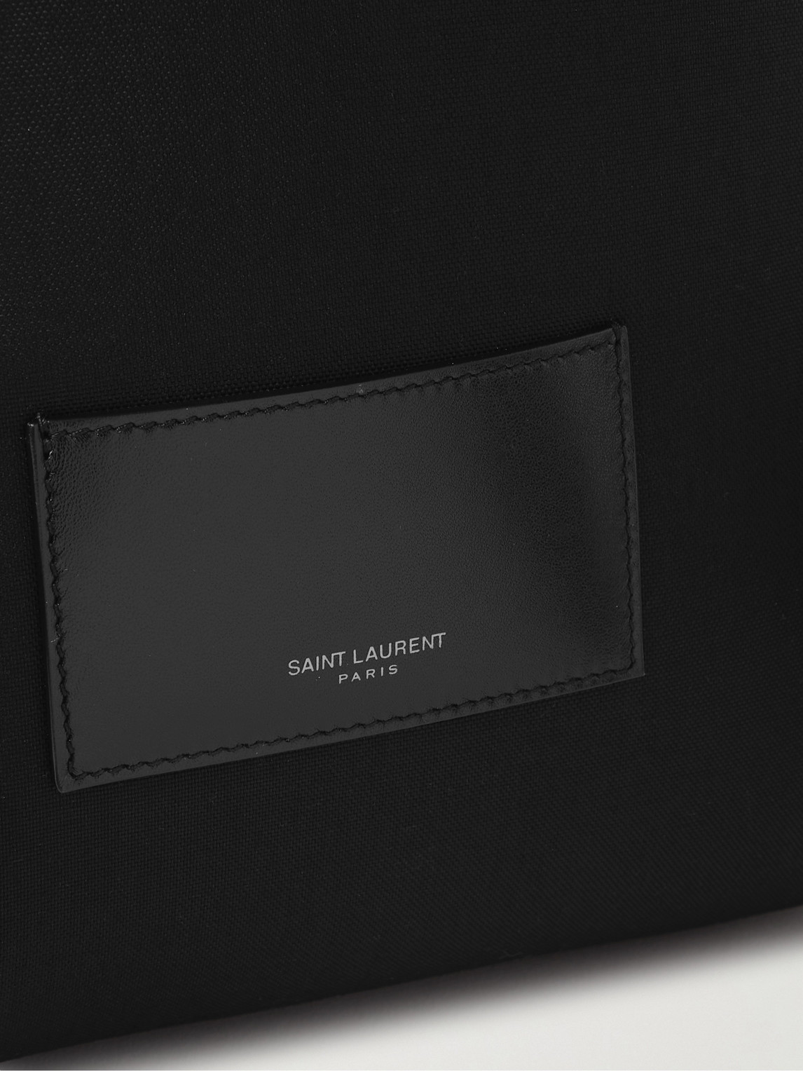 Shop Saint Laurent Logo-embroidered Leather-trimmed Shell Backpack In Black