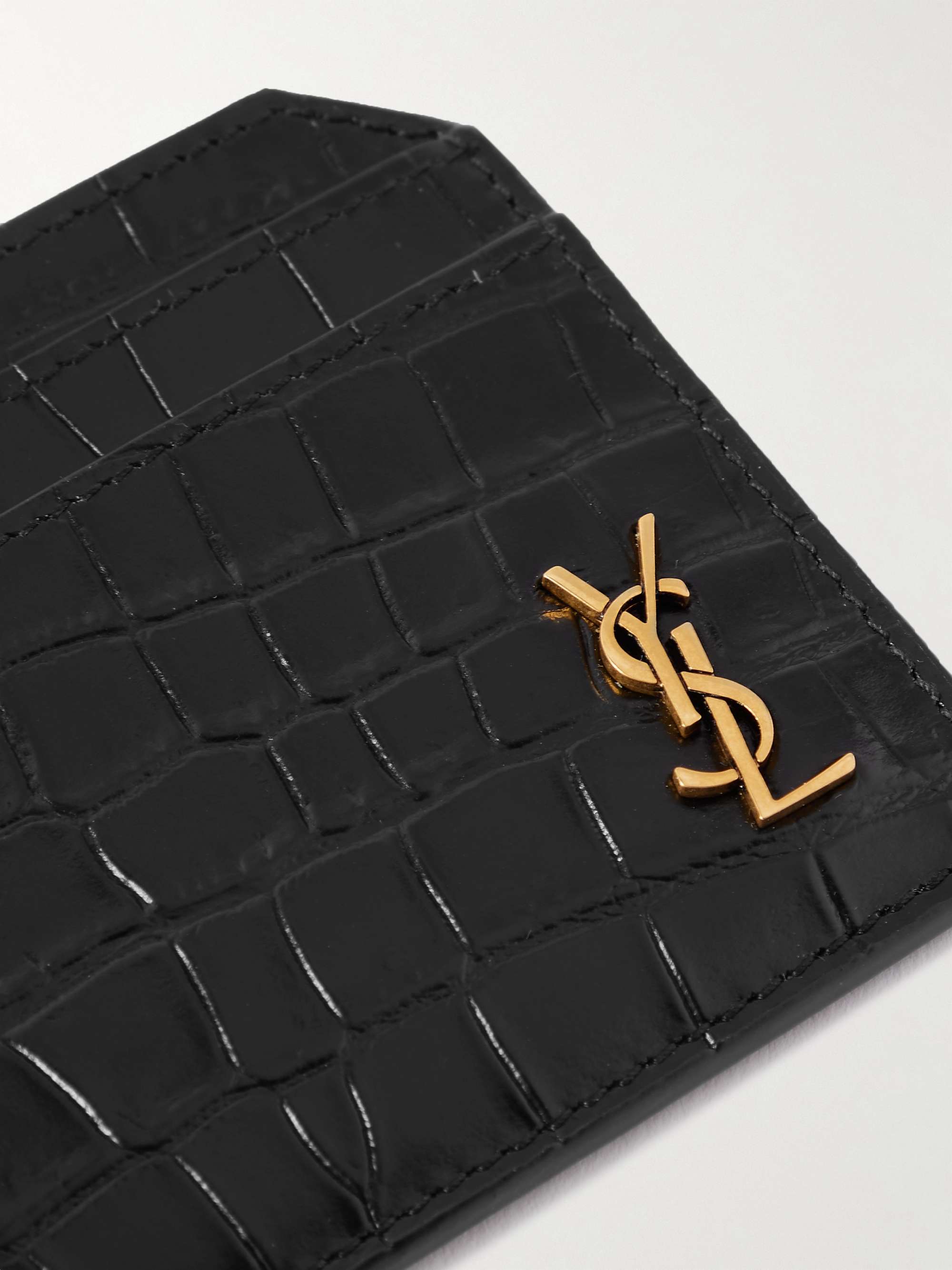 SAINT LAURENT: Tiny Cassandre credit card holder in crocodile print leather  - Black