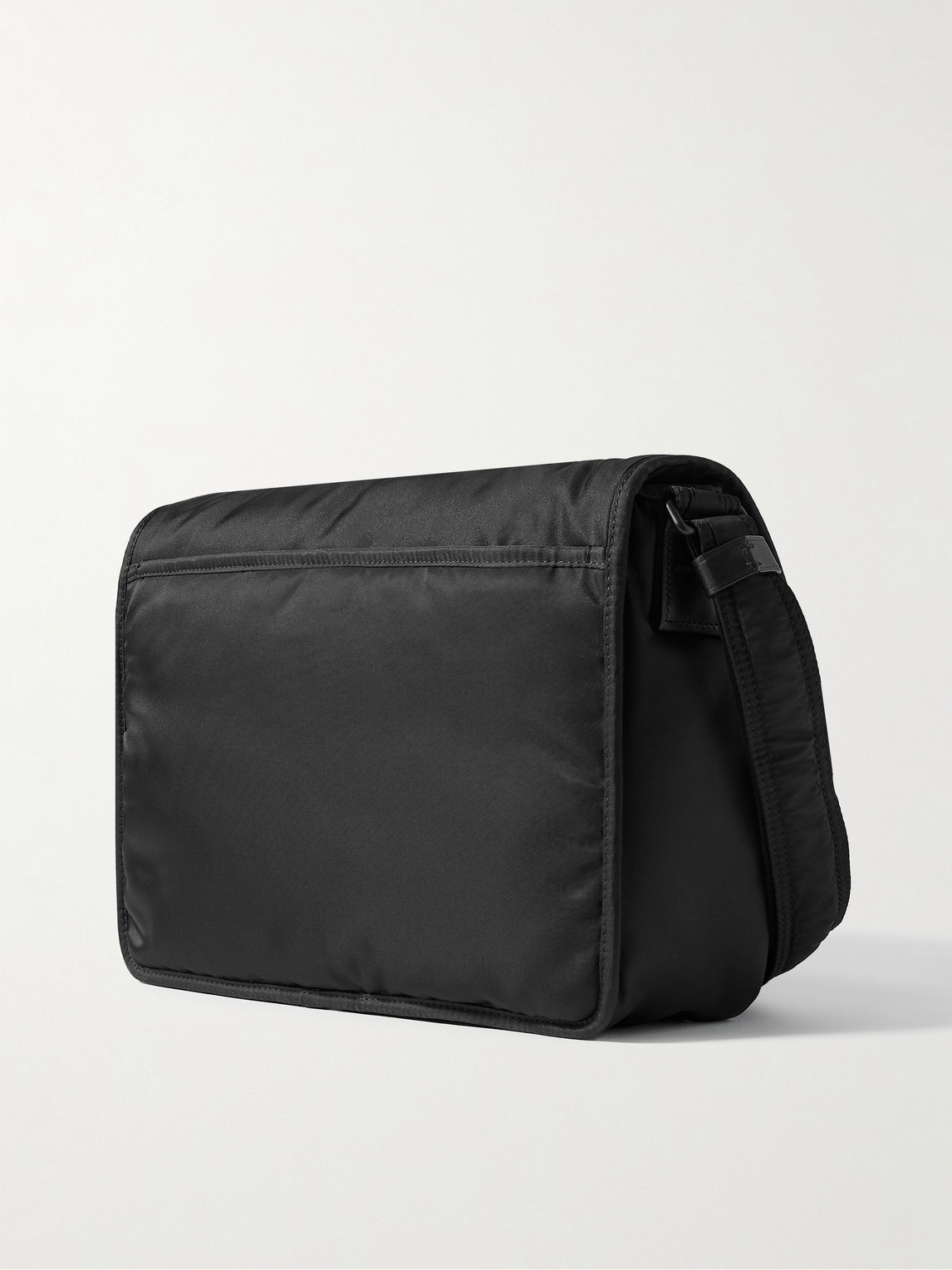 Shop Saint Laurent Niki Leather-trimmed Nylon Messenger Bag In Black