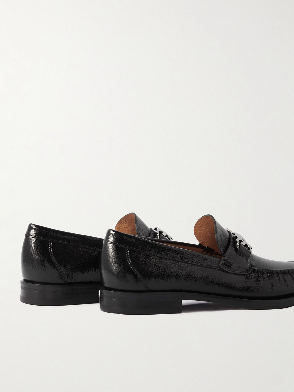 Shop Ferragamo Logo-embellished Textured-leather Loafers In Black