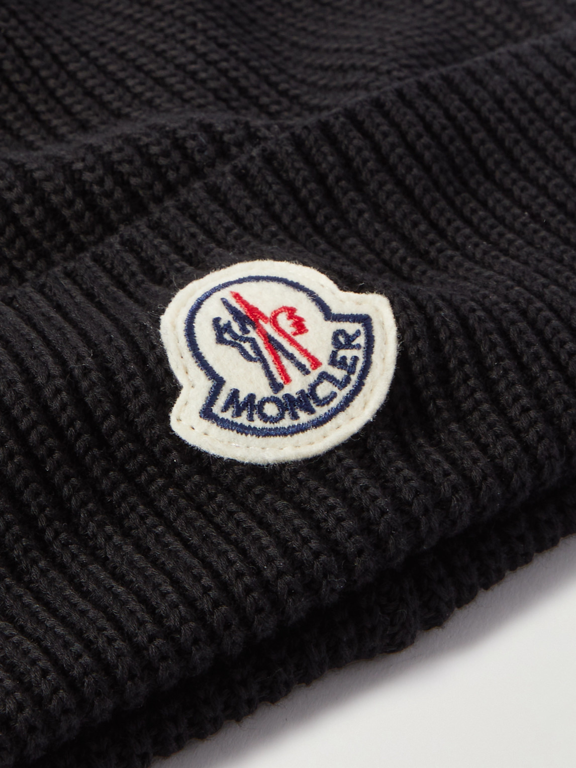 Shop Moncler Logo-appliquéd Ribbed Cotton Beanie In Black