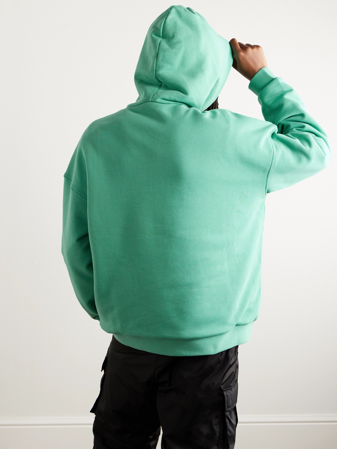 Shop Moncler Genius Pharrell Williams Reversible Logo-appliquéd Cotton-jersey And Fleece Hoodie In Green