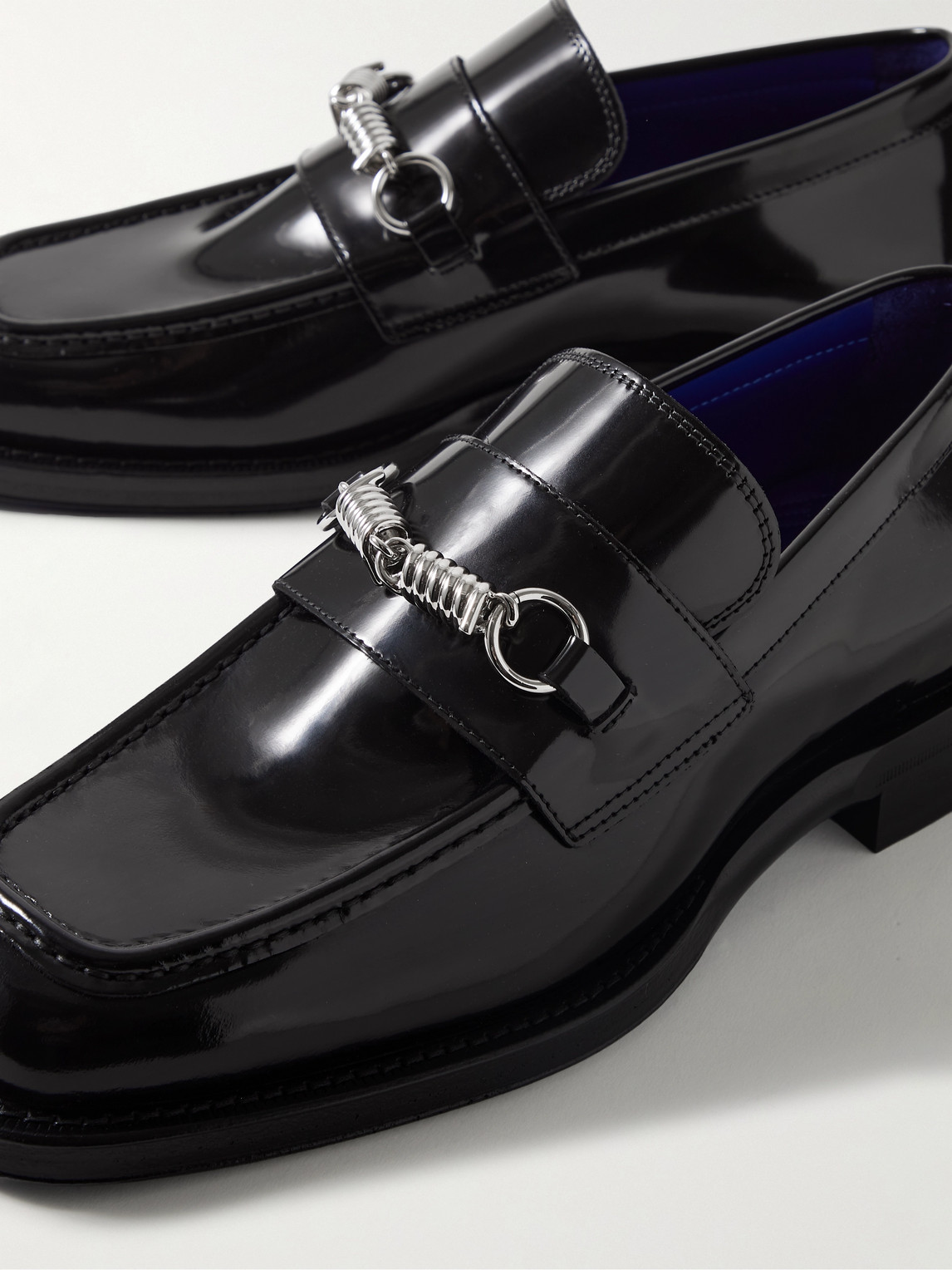 Shop Burberry Embellished Glossed-leather Loafers In Black