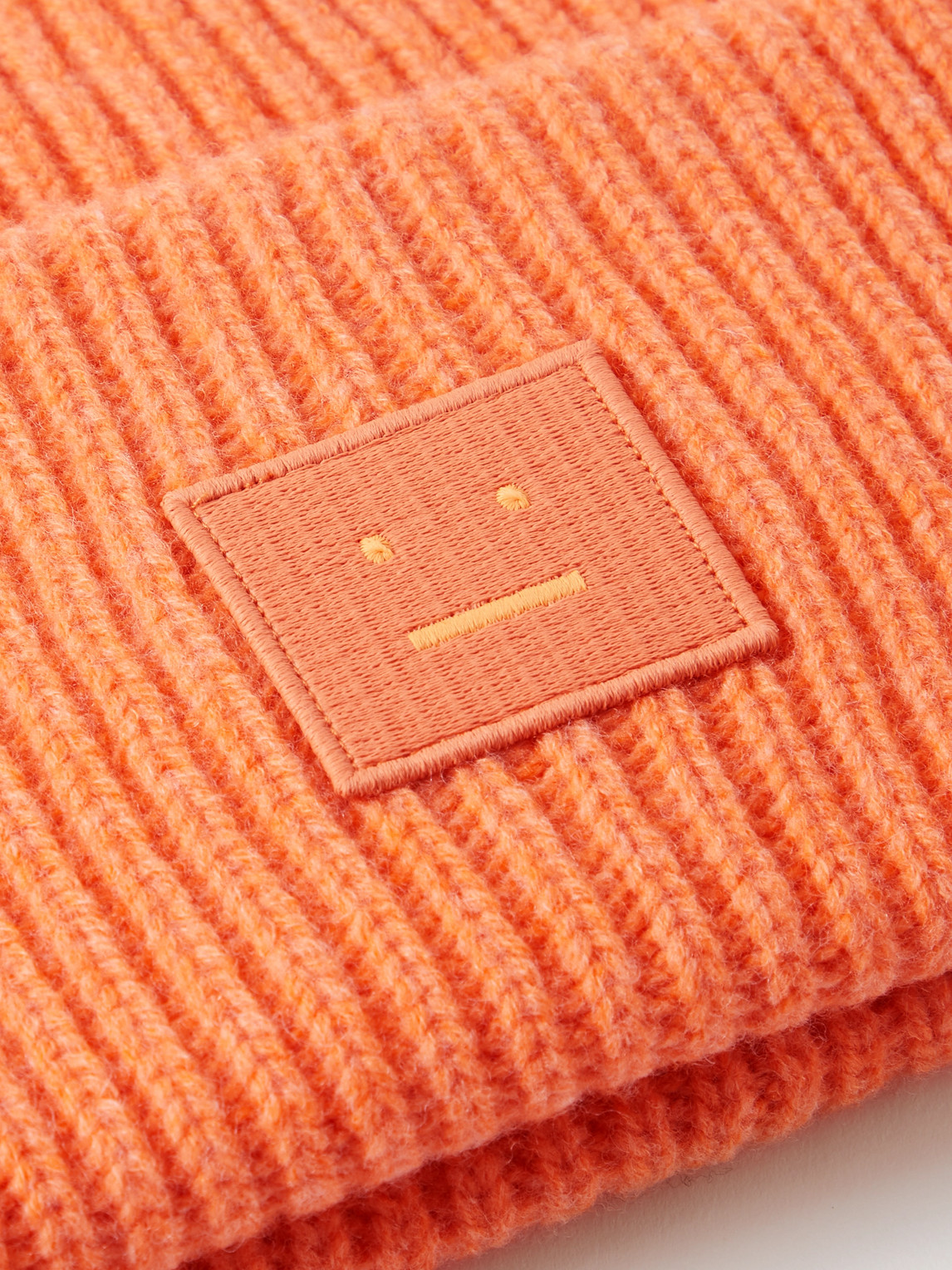 Shop Acne Studios Logo-appliquéd Ribbed Wool Beanie In Orange