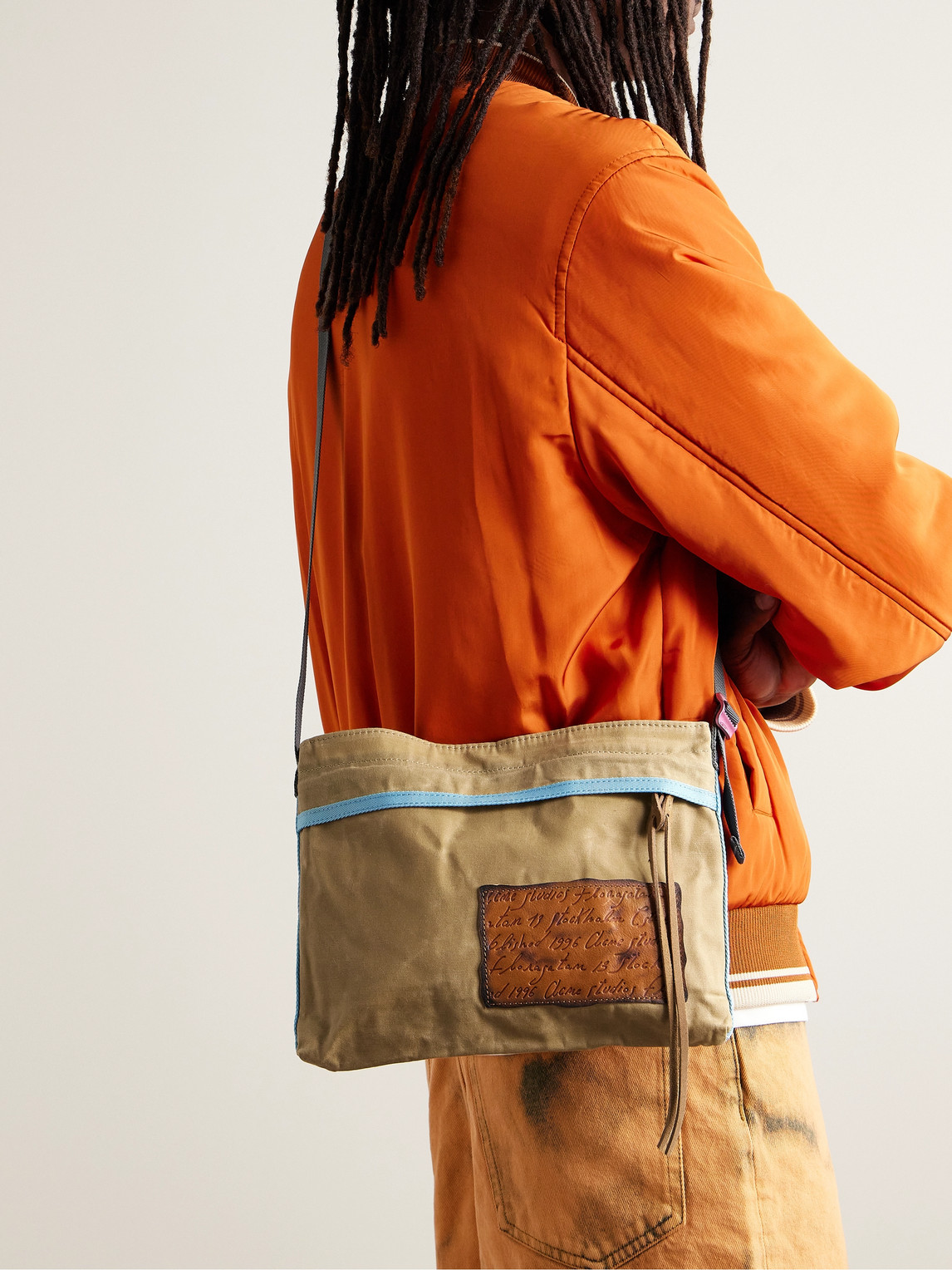 Shop Acne Studios Andemer Leather-trimmed Appliquéd Coated-canvas Messenger Bag In Neutrals