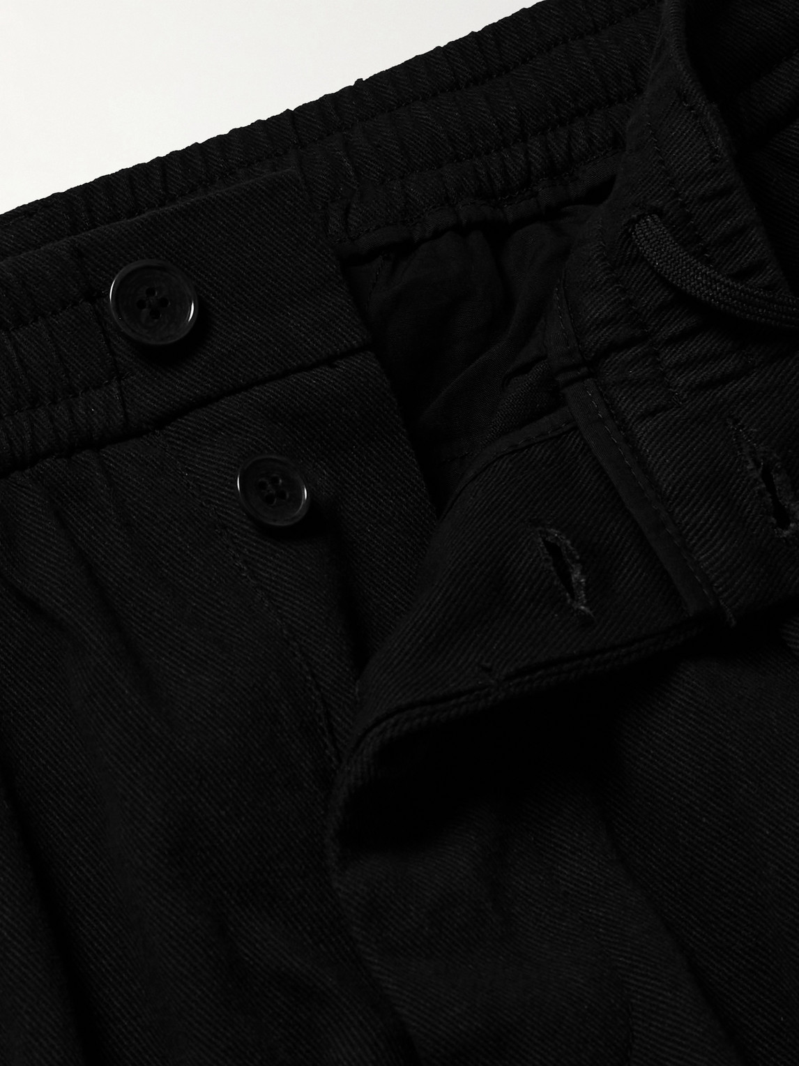 Shop Universal Works Tapered Cotton-twill Trousers In Black