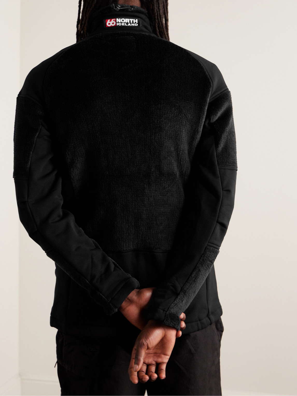 Shop 66 North Tindur Logo-appliquéd Jersey-panelled Fleece Jacket In Black