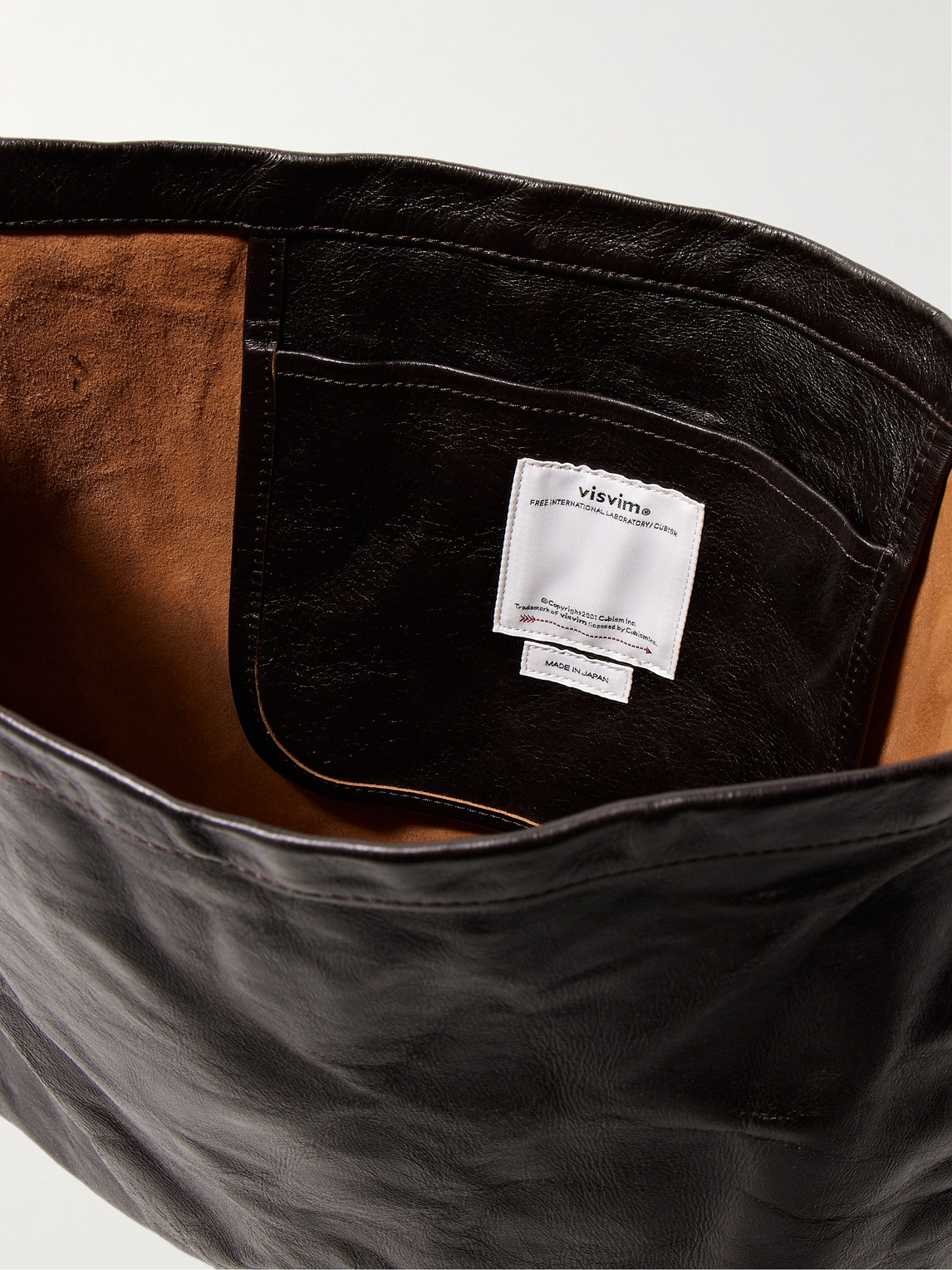 Shop Visvim Record Crinkled-leather Messenger Bag In Brown