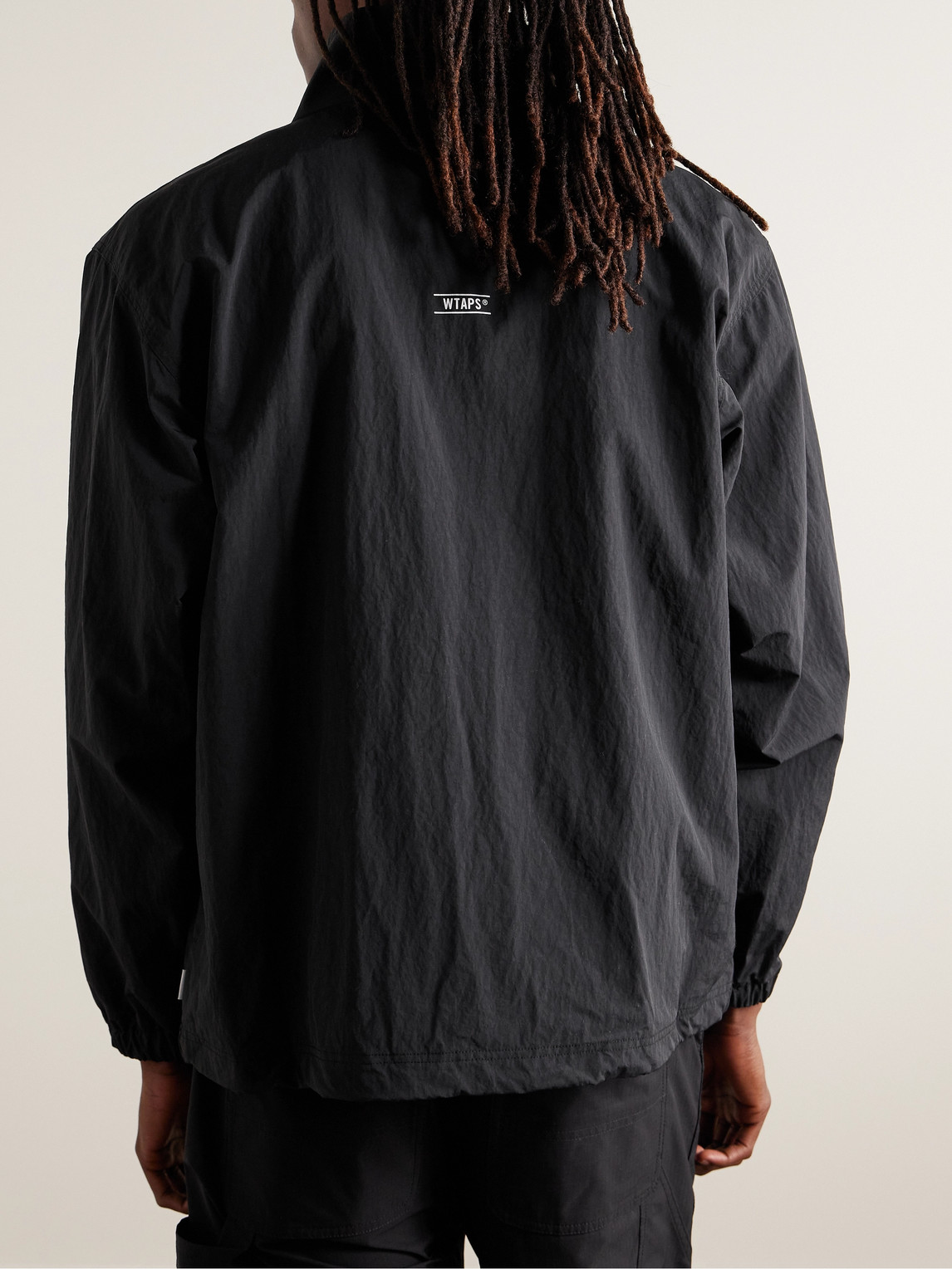 Shop Wtaps Kayan Logo-appliquéd Crinkled-nylon Half-zip Jacket In Black