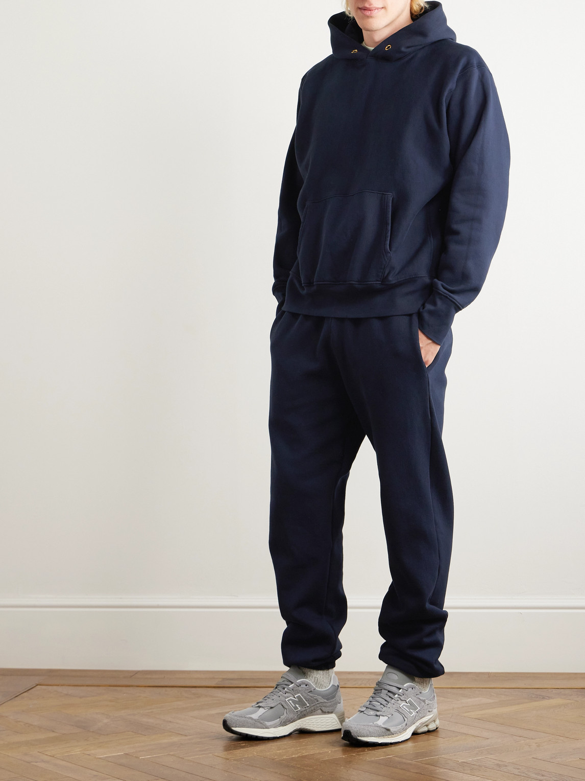 Shop Les Tien Tapered Garment-dyed Cotton-jersey Sweatpants In Blue