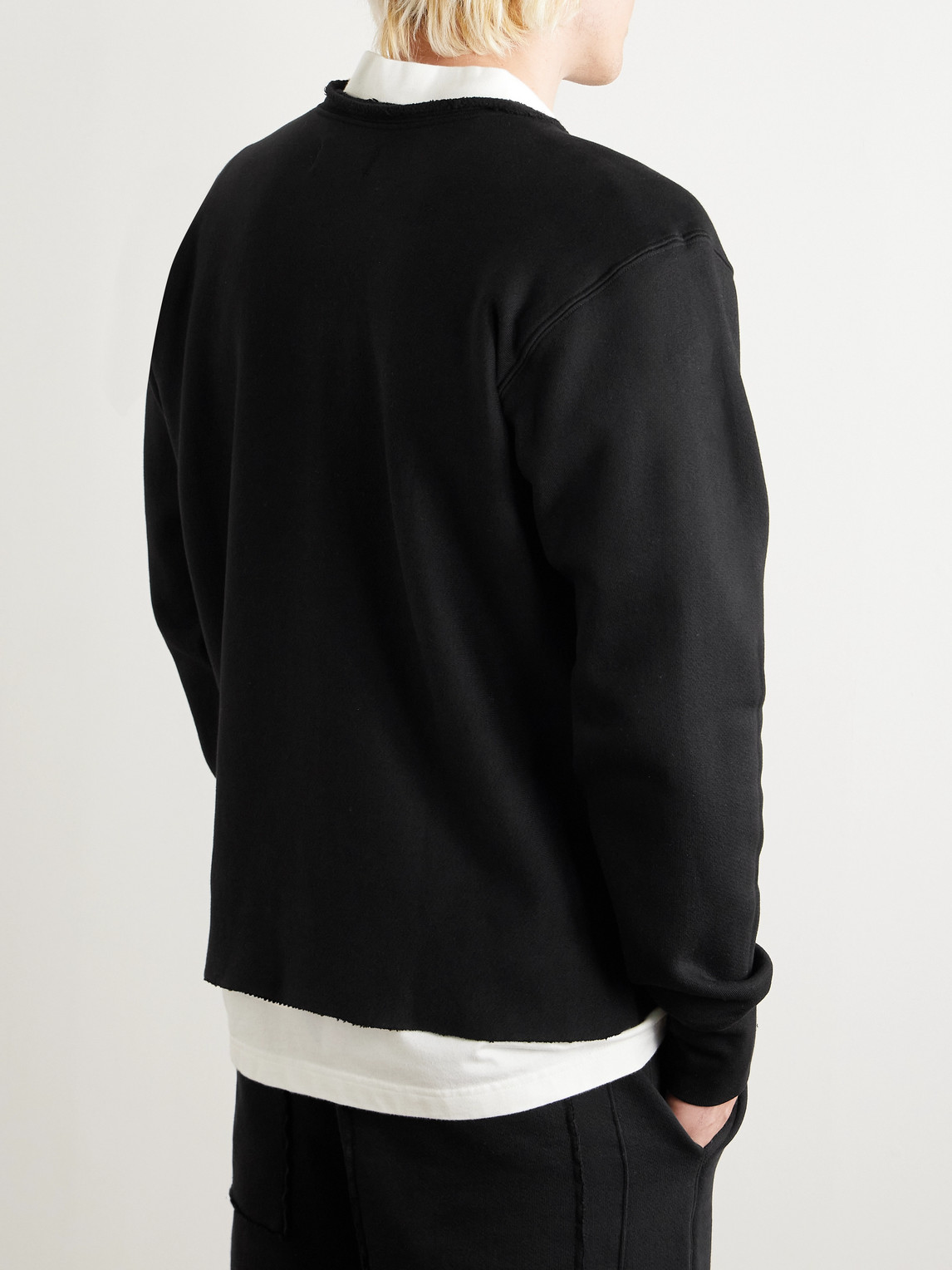 Shop Les Tien Distressed Cotton-jersey Sweatshirt In Black